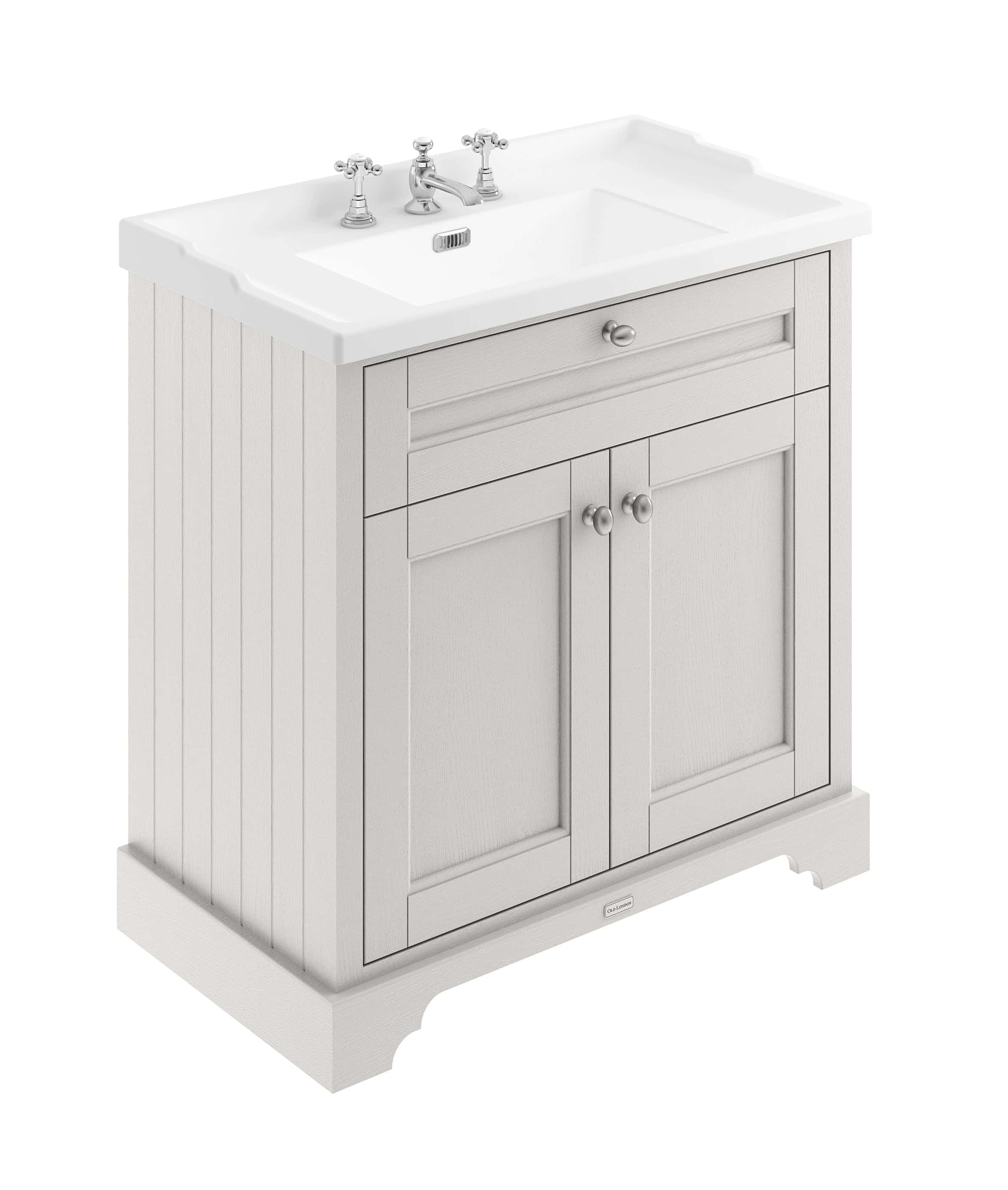 Vintage-style bathroom vanity with ceramic sink and chrome taps, ideal for classic bathroom renovations and modern plumbing fixtures. Suitable for traditional and contemporary bathroom decor.