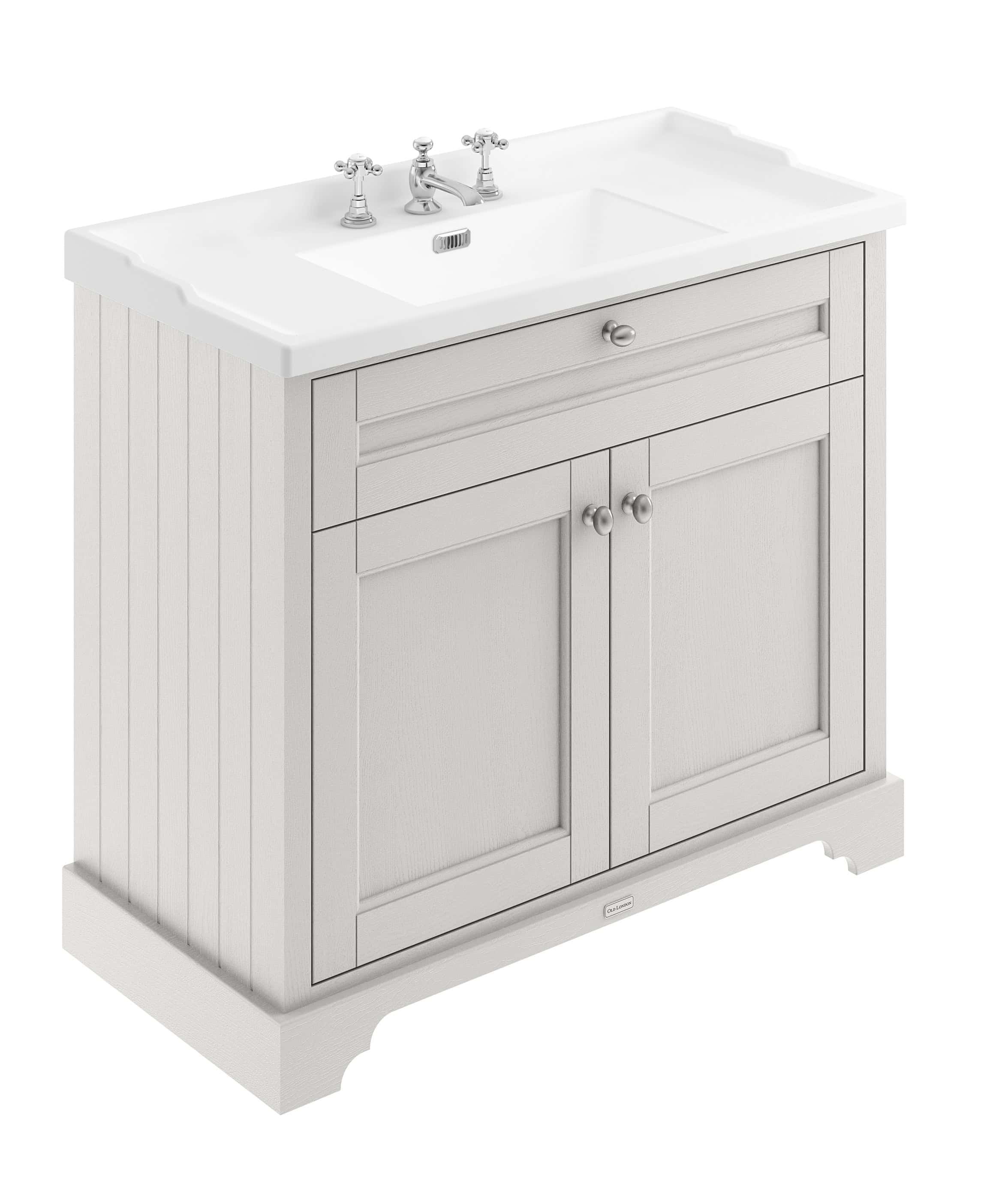 Polished white bathroom vanity with integrated sink and classic chrome faucet, ideal for stylish bathroom renovation.
