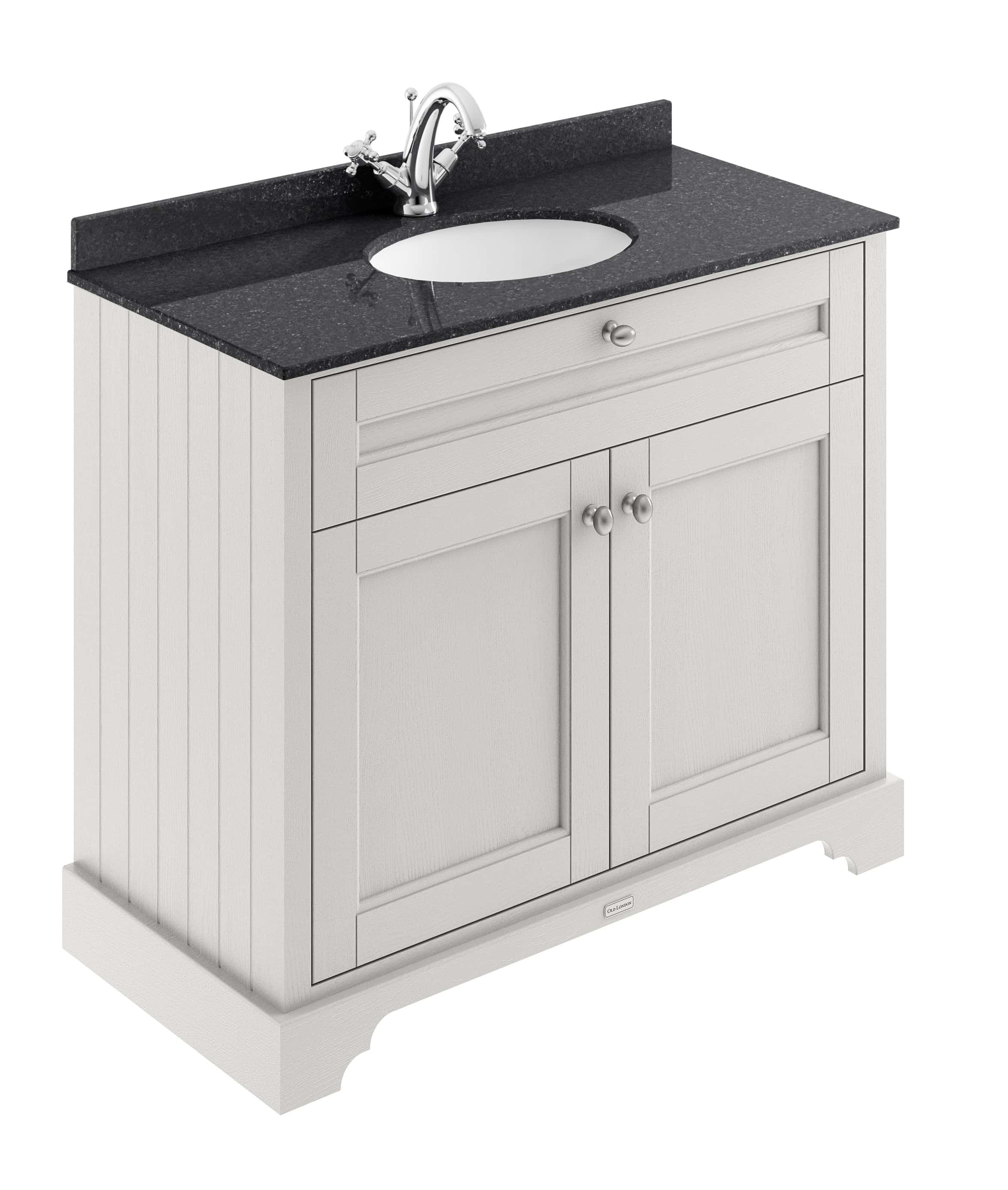 Sleek white bathroom vanity with black granite countertop and integrated sink, ideal for modern bathroom designs and renovations.