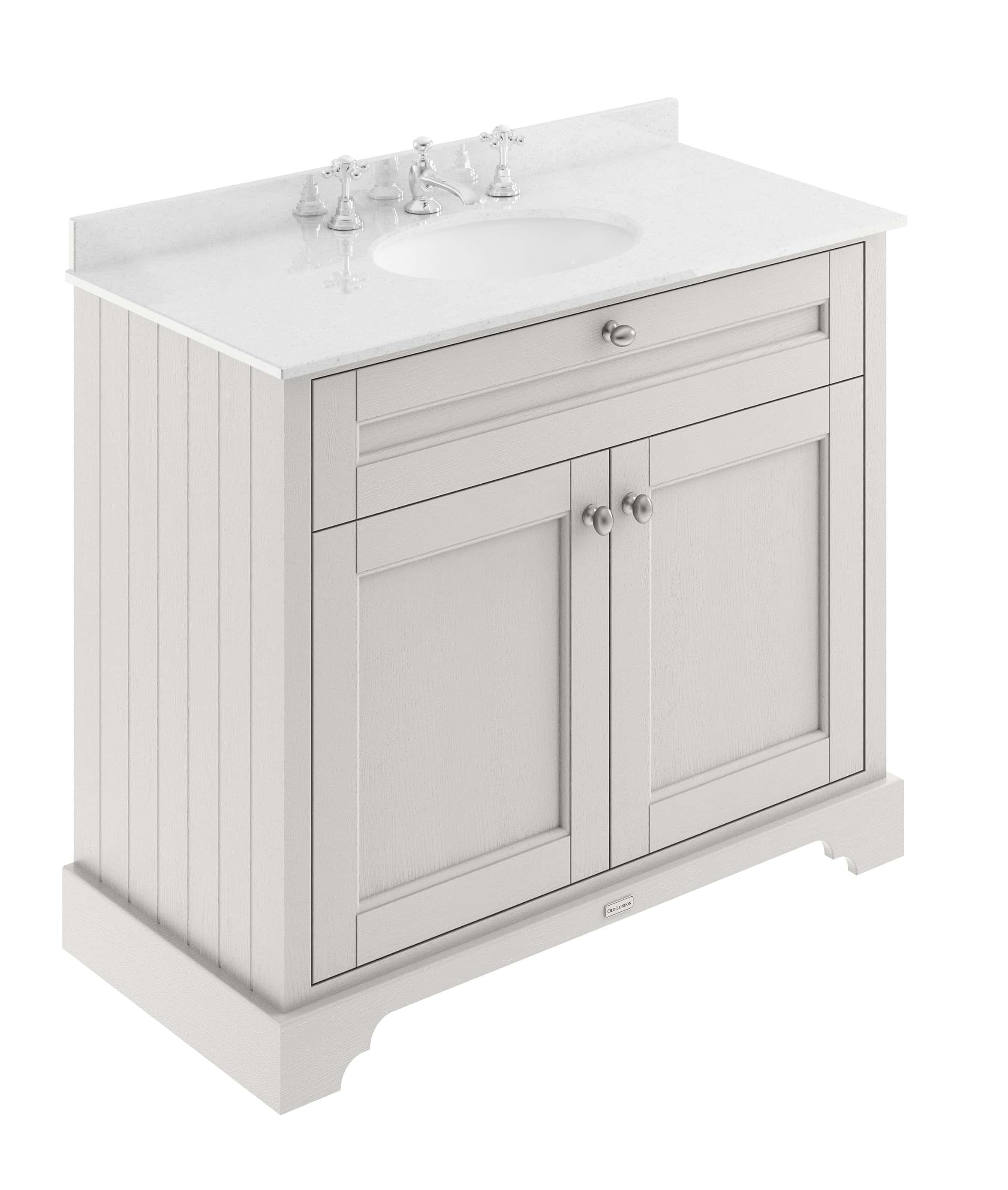 Elegant bathroom vanity unit with a white finish, countertop, and storage cabinets for modern bathroom organisation. Perfect for stylish and functional bathroom designs.