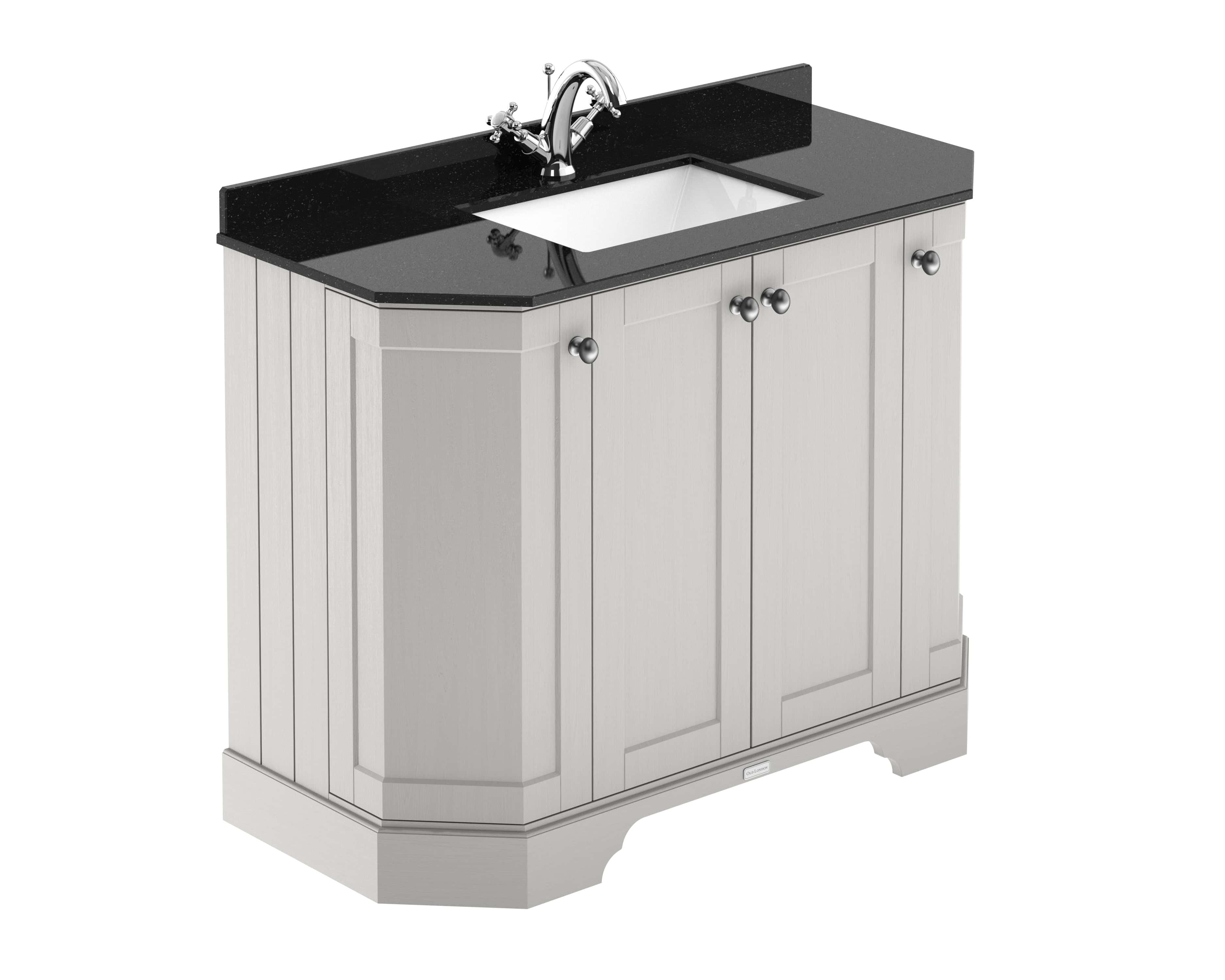 Polished black granite bathroom vanity unit with white cabinetry and chrome handles, featuring an integrated sink and elegant curved design for modern bathroom upgrade.
