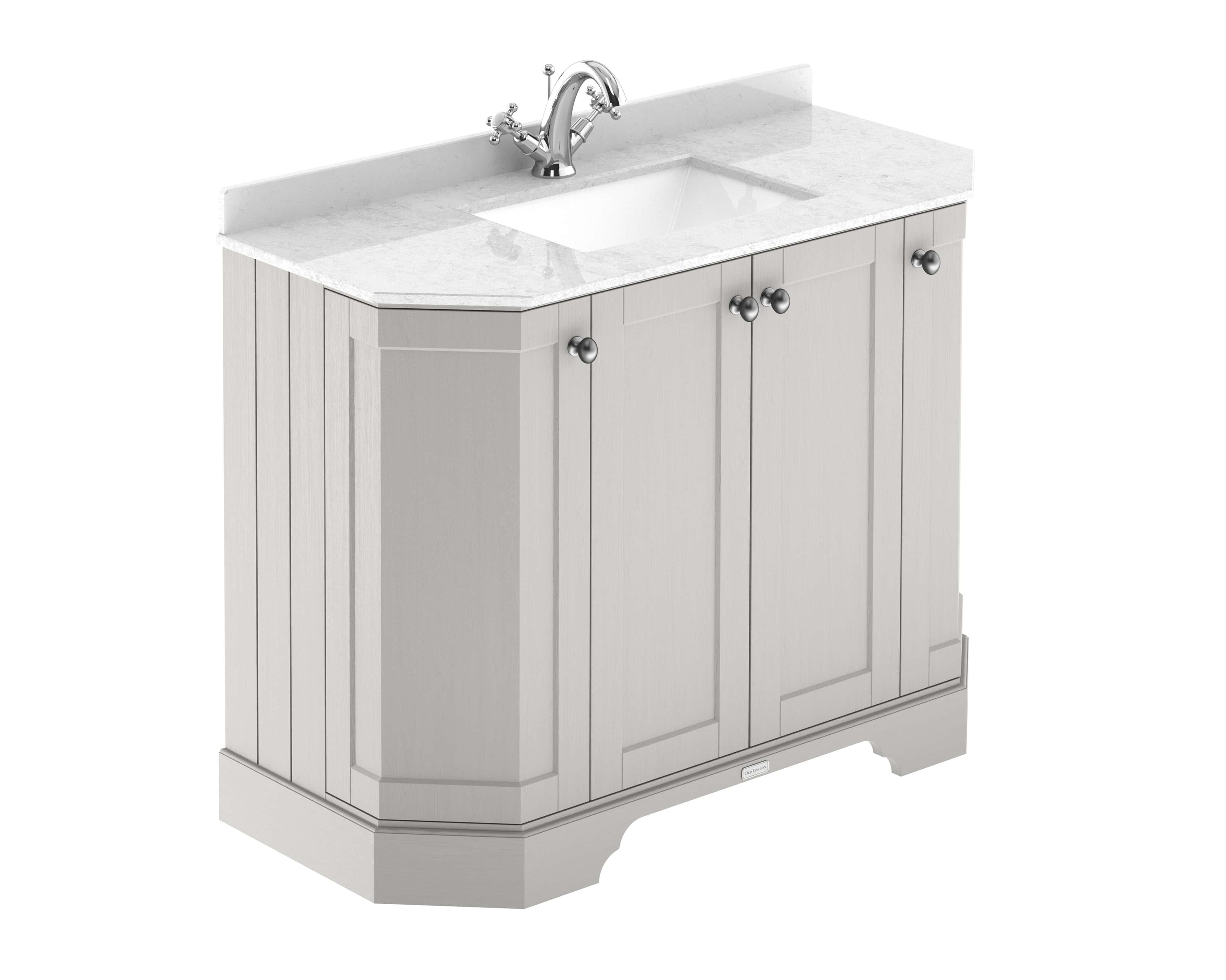 Shaker-style bathroom vanity with marble countertop and undermount sink, featuring classic design and chrome fixtures for modern bathroom elegance.