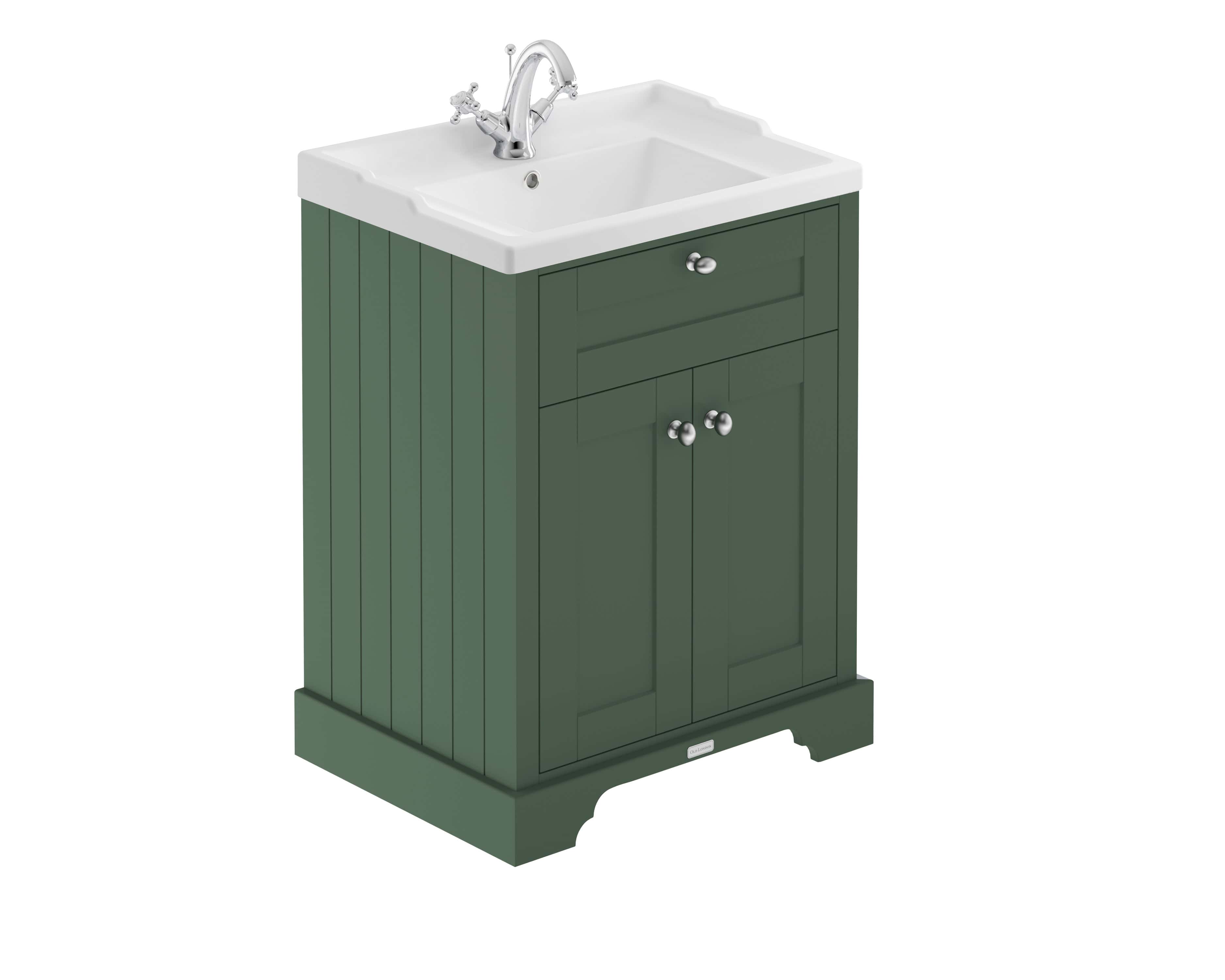 Vintage bathroom vanity unit with ceramic sink and chrome tap, ideal for classic or cottage-style bathrooms. Features green wooden cabinetry, practical storage drawers, and a traditional design.