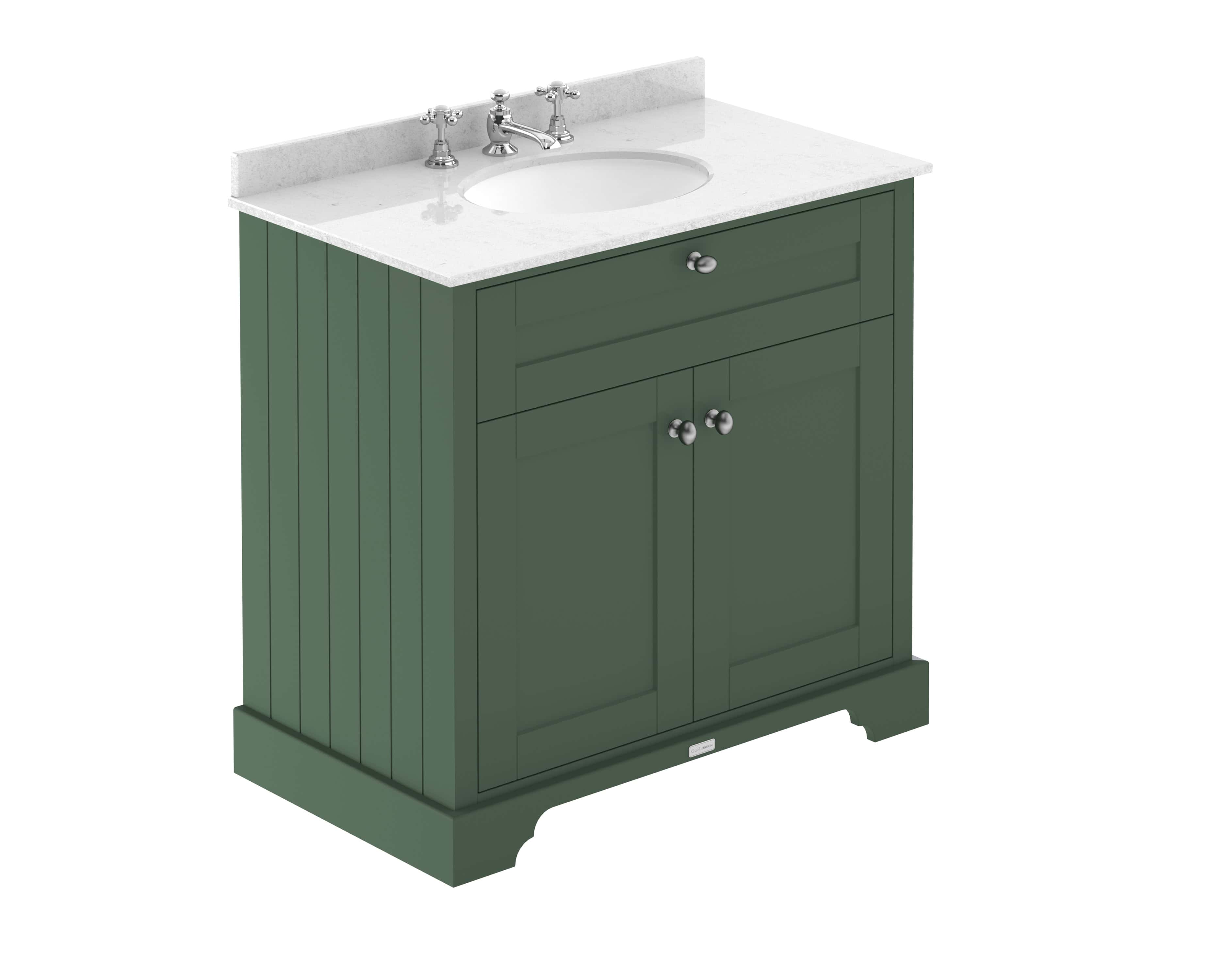 Elegant green bathroom vanity with classic design, featuring a white marble countertop and chrome fixtures, perfect for modern bathroom renovations.