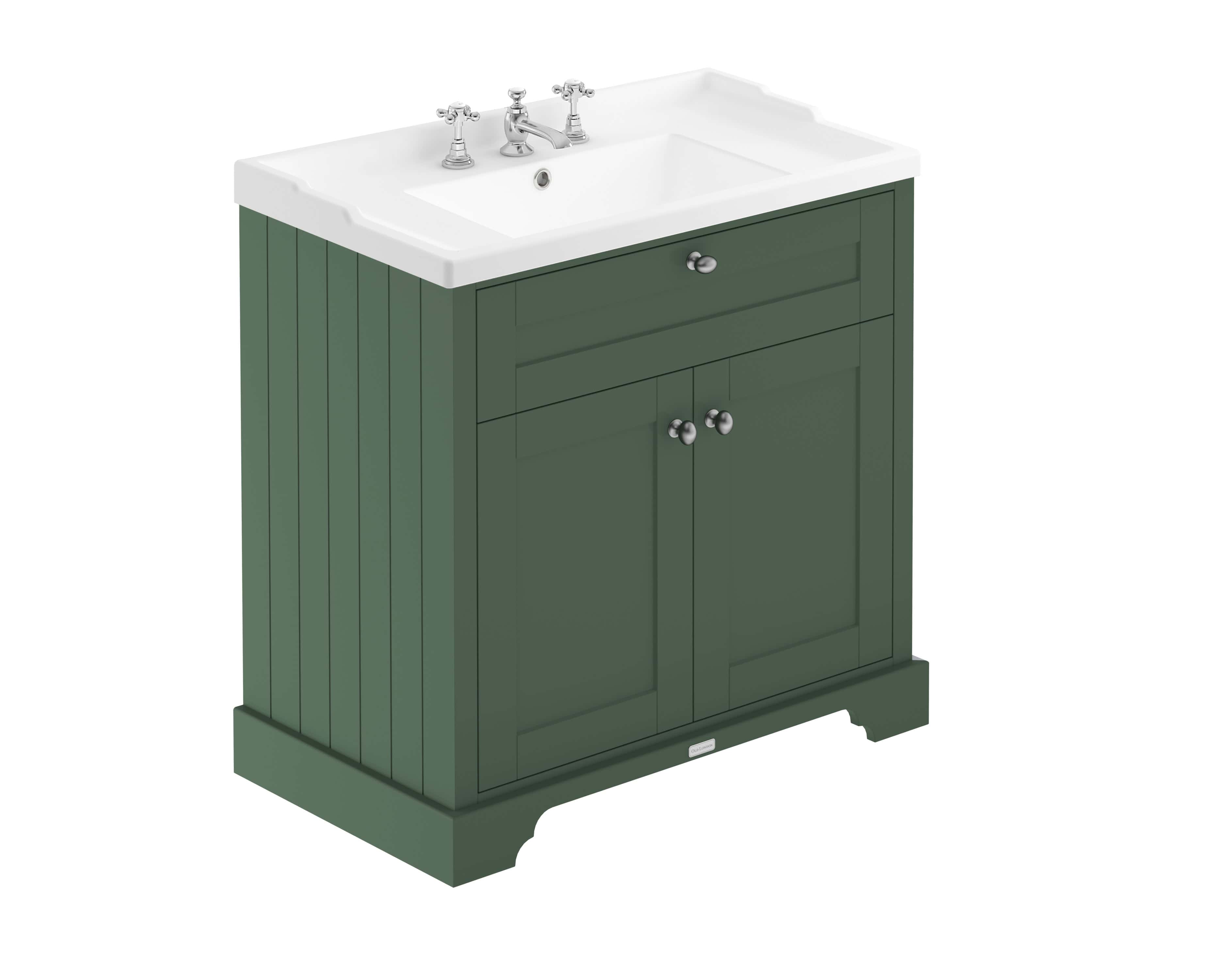 Elegant green bathroom vanity with ceramic sink and chrome fixtures, perfect for a stylish and functional bathroom upgrade. Ideal for bathroom renovations and modern bathroom décors.
