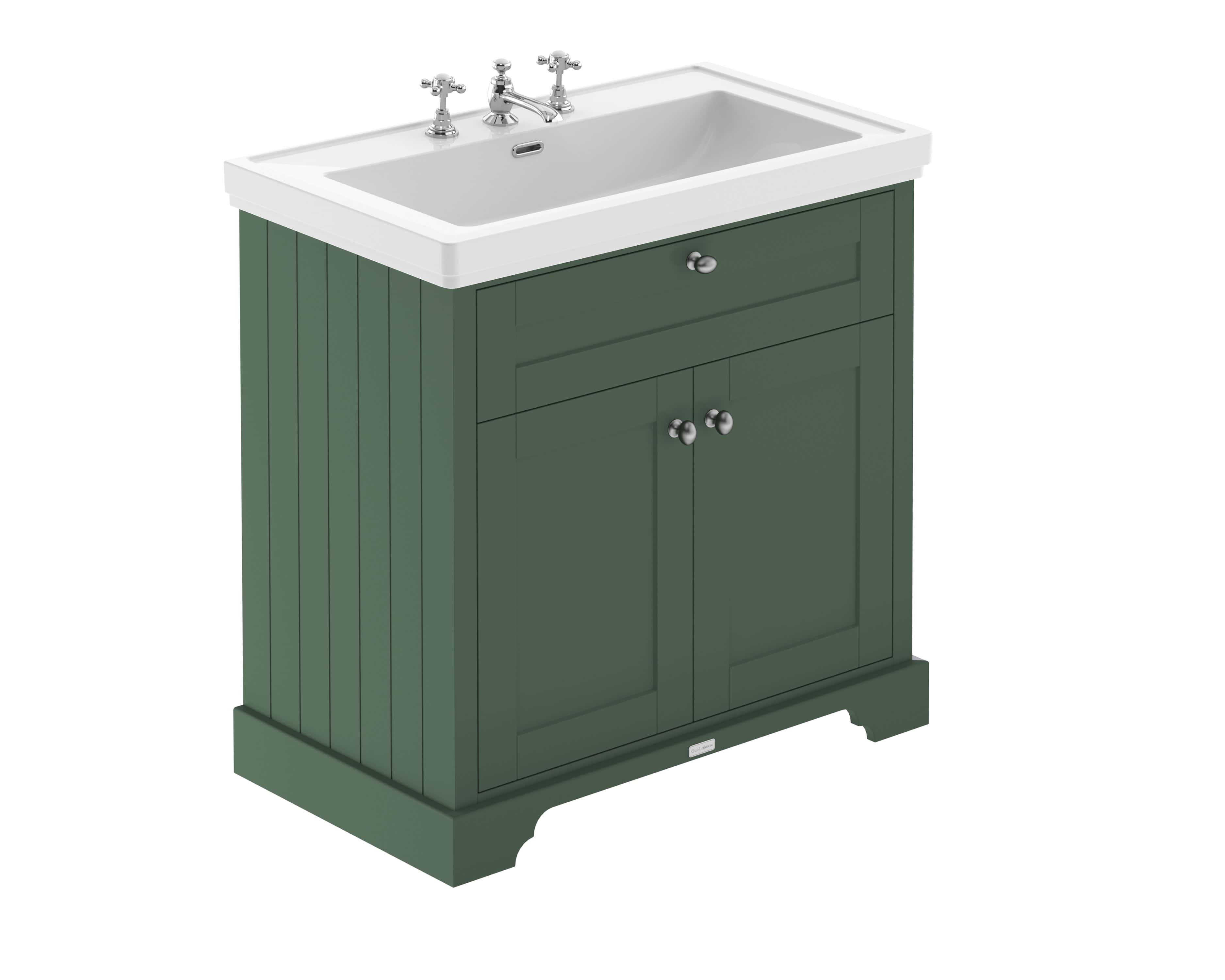 Antique green bathroom vanity with ceramic sink and chrome mixer taps, ideal for traditional or vintage-style bathrooms. Perfect for upgrading your bathroom with classic elegance.