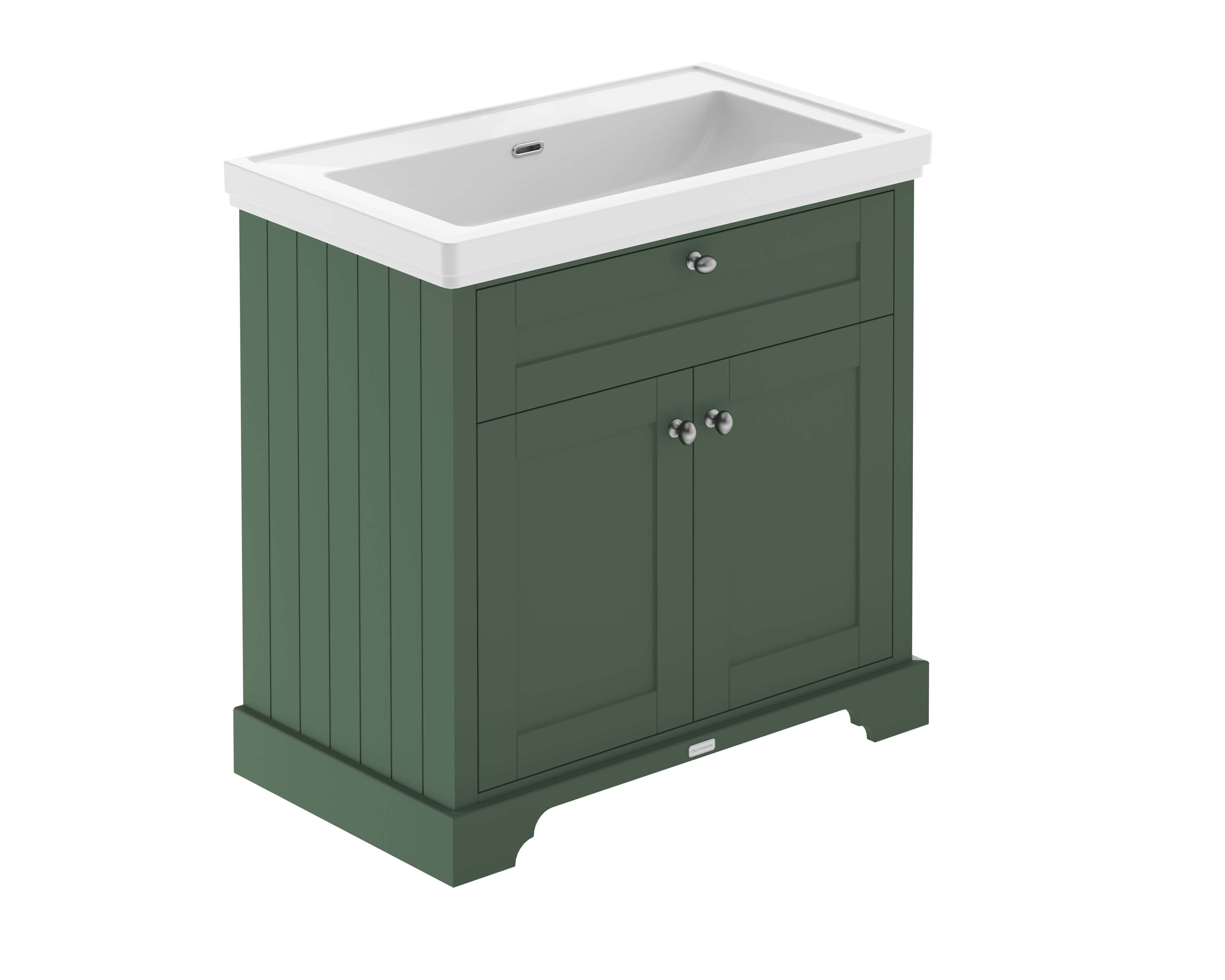 Luxurious green bathroom vanity cabinet with integrated sink, perfect for stylish bathroom renovations and modern washroom designs.