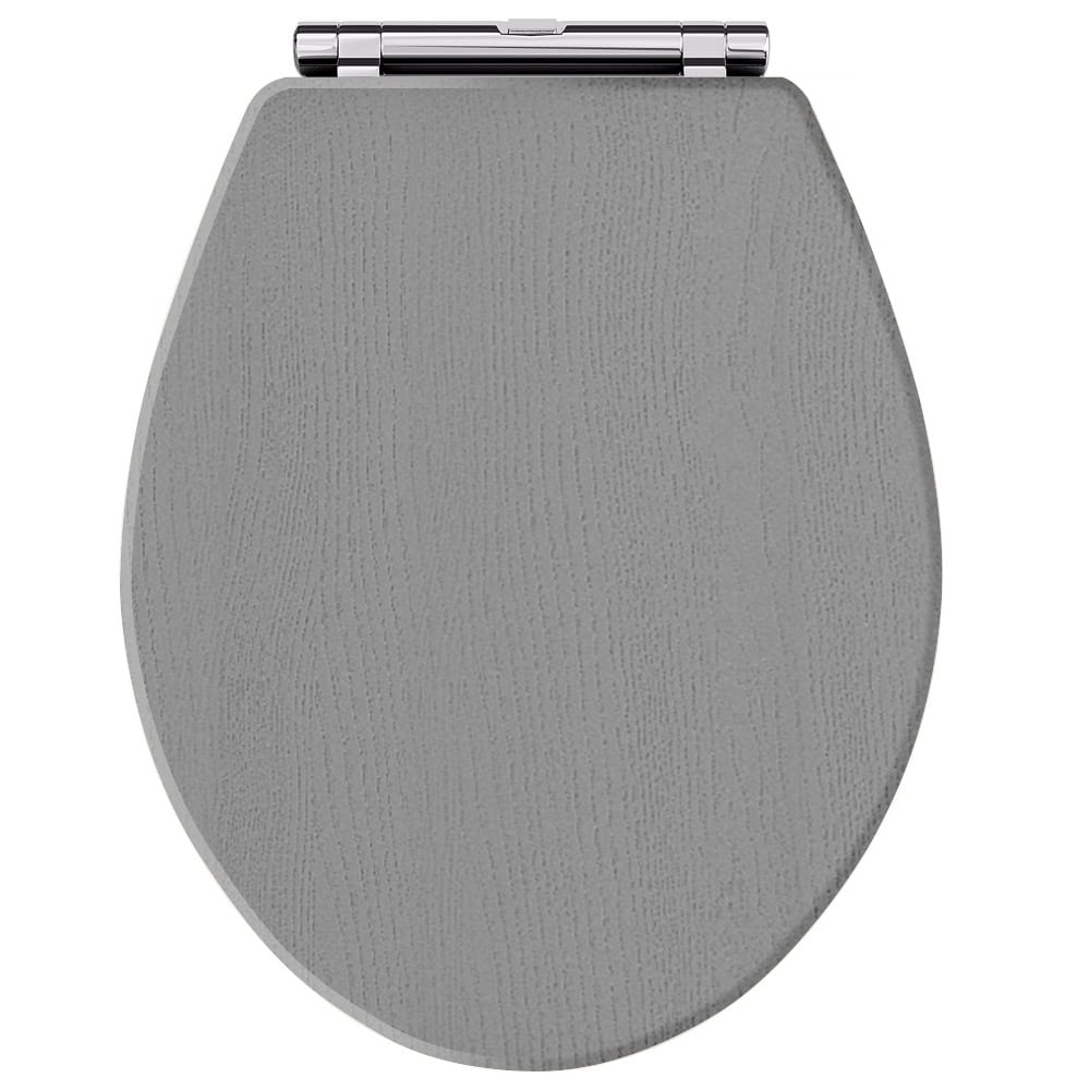 Grey toilet seat with textured surface, ideal for modern bathroom upgrades and comfort.