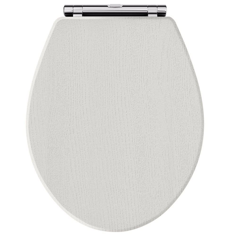 Luxurious white toilet seat with textured surface, perfect for modern bathroom upgrades, combining comfort and style.