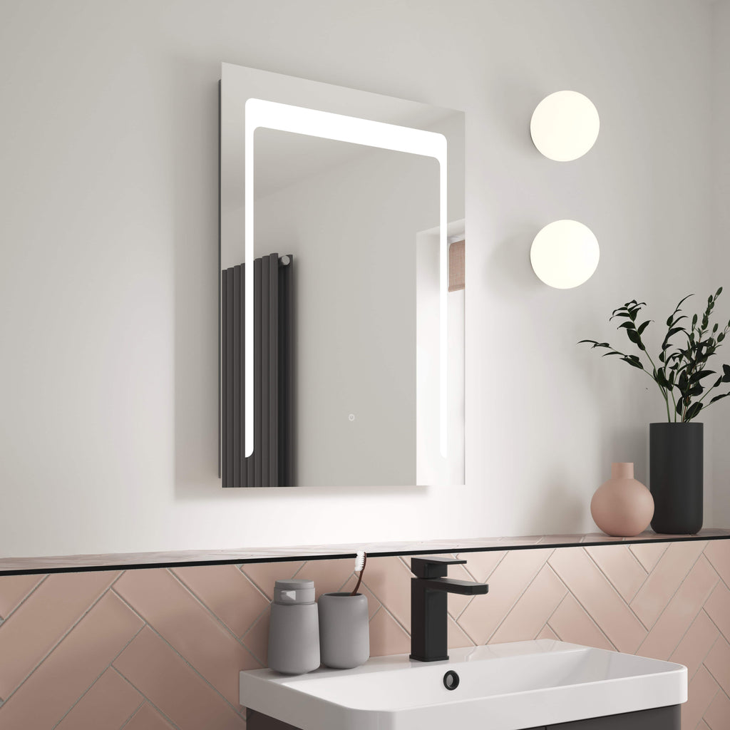 Stylish modern bathroom mirror with built-in LED lighting, minimalist black faucet, and contemporary wall light fixtures creating a sleek, functional space ideal for bathroom décor.
