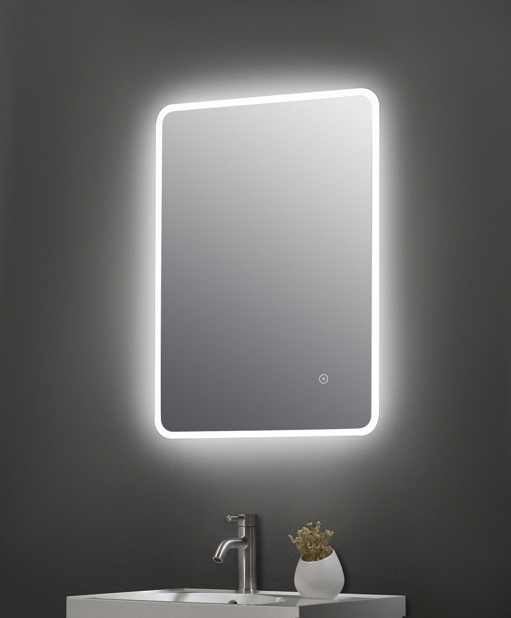 Bright LED illuminated modern bathroom mirror with touch sensor, ideal for contemporary bathroom vanity setups.