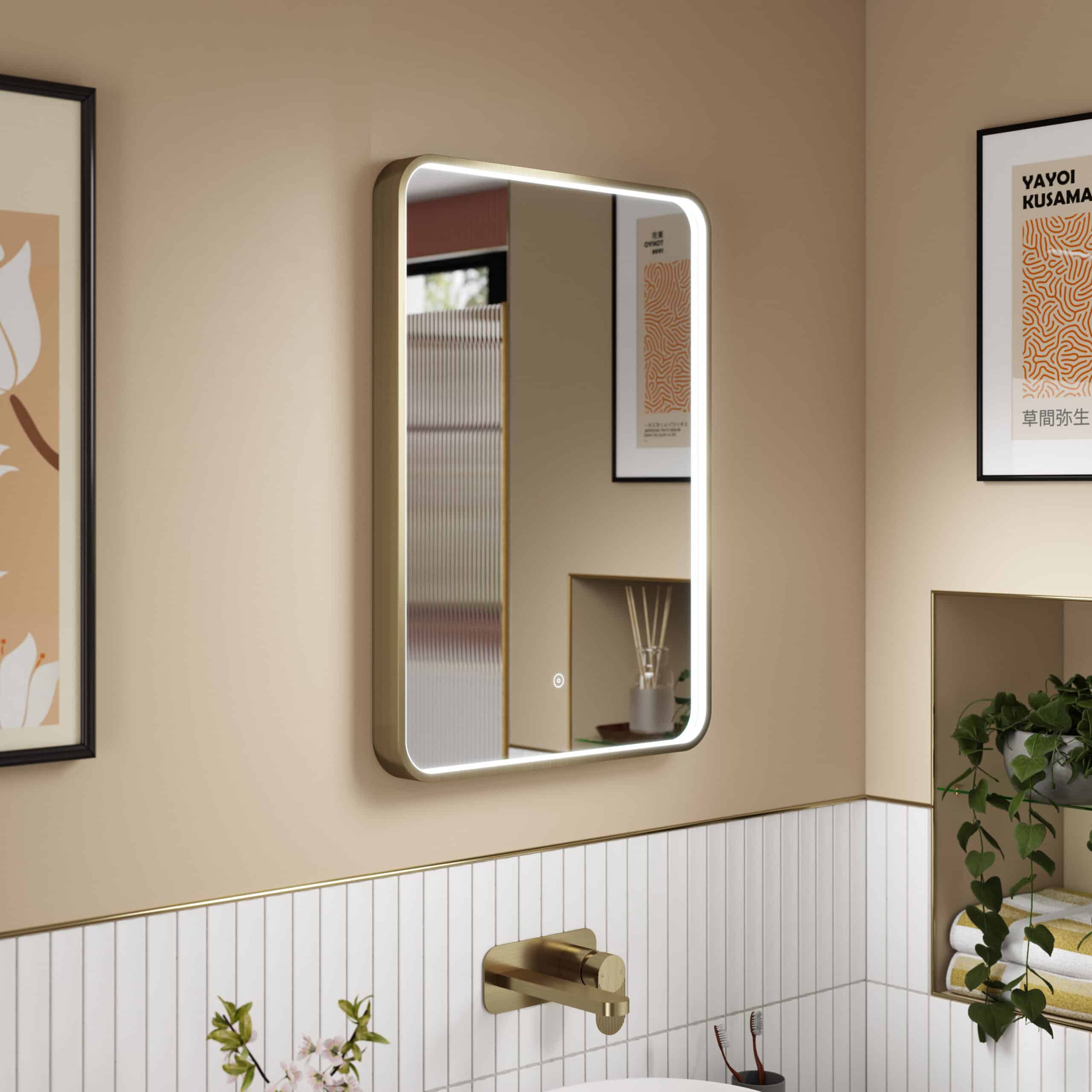 Sleek bathroom mirror with LED lighting showcasing modern design and illuminated features for contemporary Bubly Bathrooms.