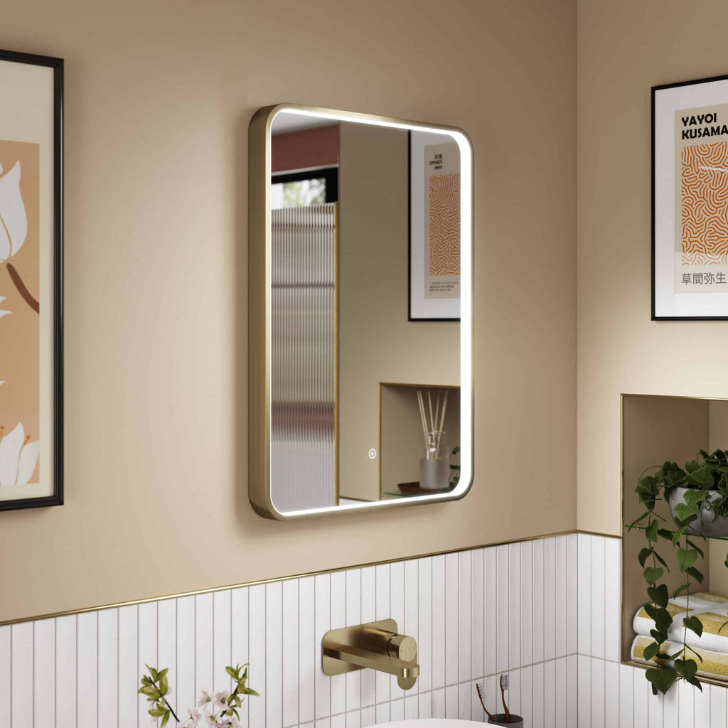 Sleek bathroom mirror with LED lighting showcasing modern design and illuminated features for contemporary Bubly Bathrooms.