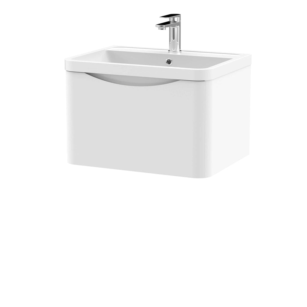 Contemporary white bathroom vanity unit with integrated sink and chrome tap. Perfect for modern bathroom decor, combining style and functionality.