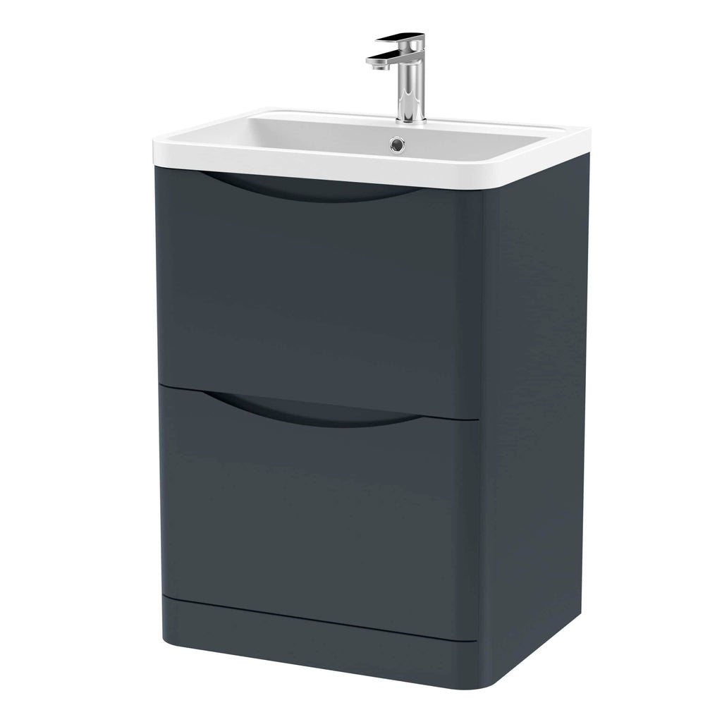 Modern grey bathroom vanity with integrated sink and chrome faucet, ideal for contemporary bathroom designs.