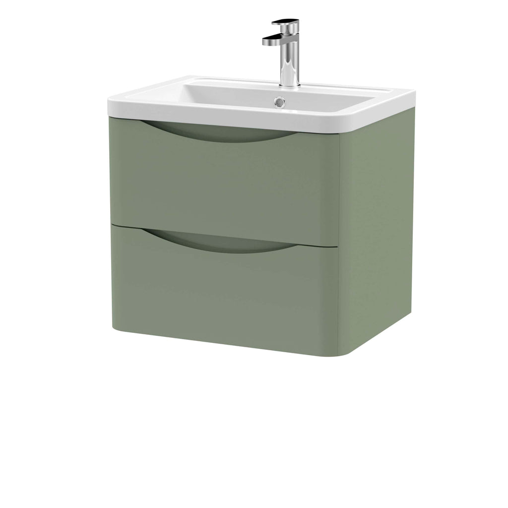 Sleek green bathroom vanity with integrated sink and chrome faucet, ideal for modern bathroom designs. Compact storage drawers provide practical organisation for bathroom essentials.