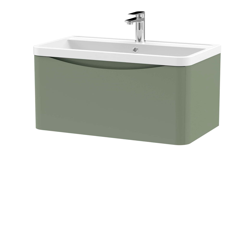 Minimalist green wall-mounted bathroom sink with integrated storage and chrome faucet for modern bathroom décor.
