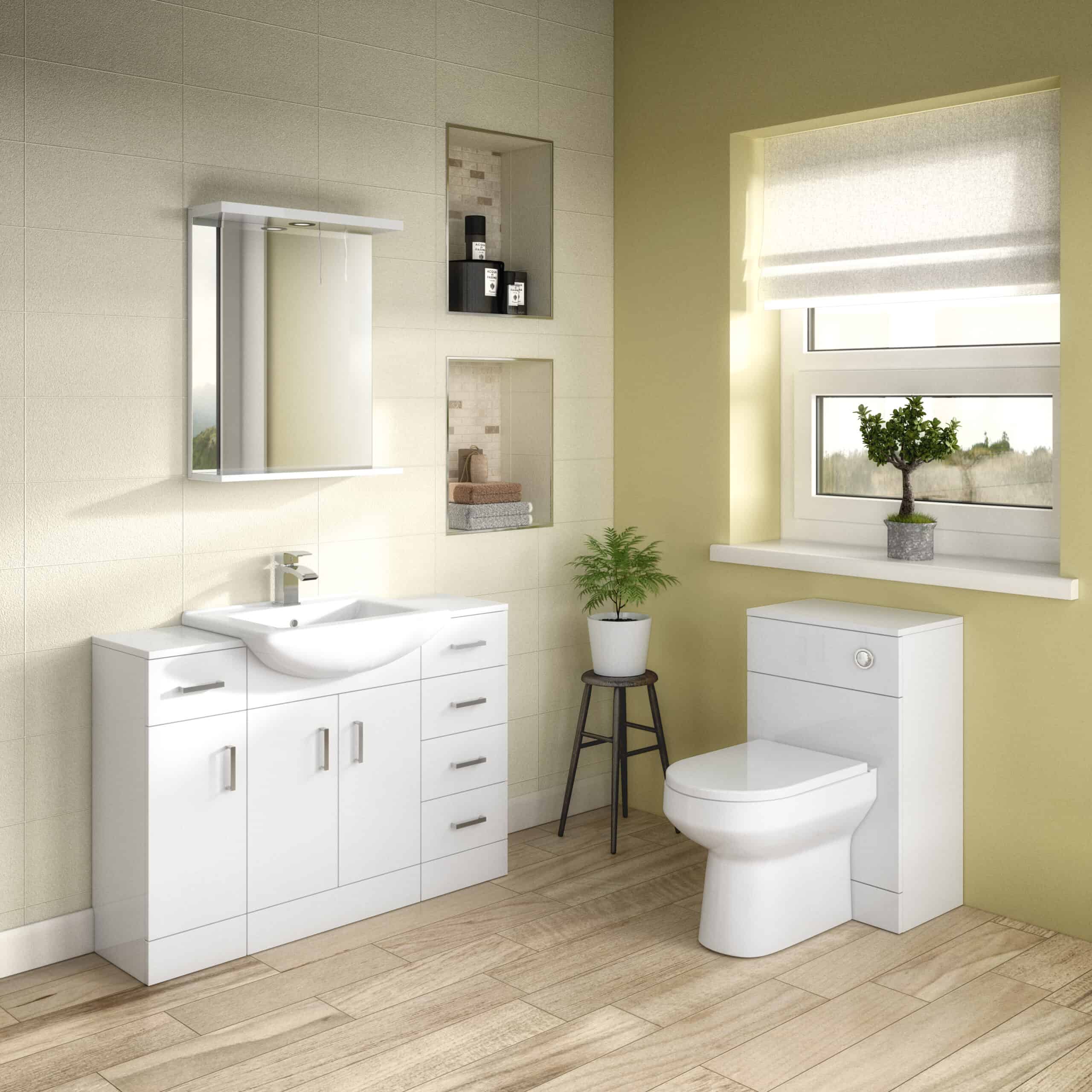 Modern white bathroom vanity with sink, mirror, and storage drawers, complemented by a sleek toilet and natural decor, creating a bright and functional bathroom space.