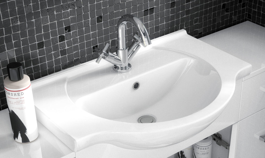 Sleek white bathroom sink with modern chrome tap and black mosaic tile wall, showcasing stylish bathroom fixtures and accessories.
