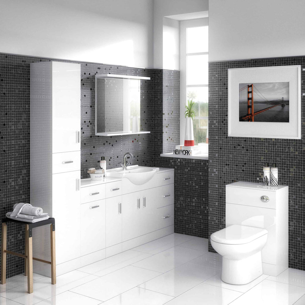 Sleek modern bathroom with black mosaic tiles, white vanity unit, and toilet, featuring contemporary decor and ample natural light, perfect for stylish bathroom design.