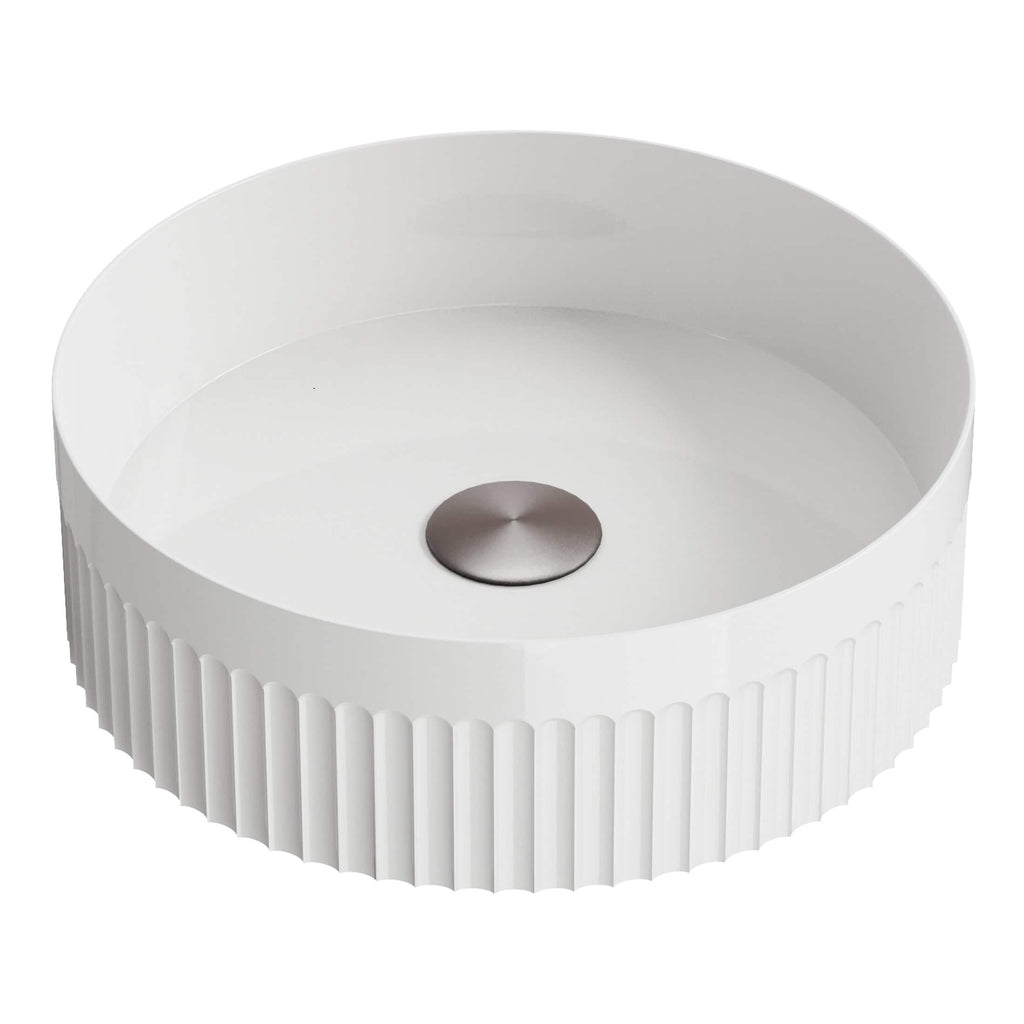 Sleek white circular bathroom sink with ribbed exterior design and modern metallic drain cover, ideal for contemporary bathroom decor.