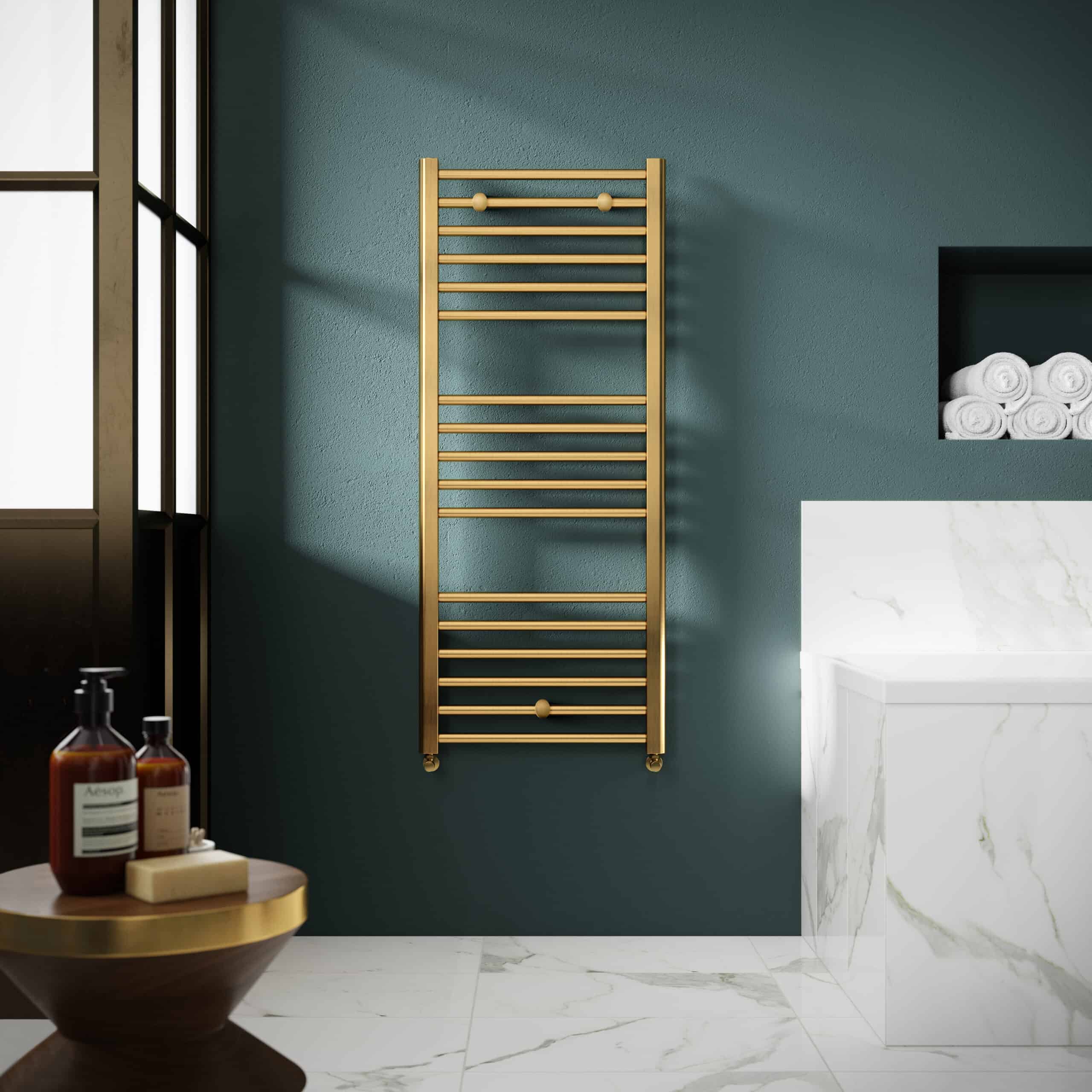 Stylish gold towel radiator in modern bathroom with marble accents and minimalist decor. Perfect for adding luxury and functionality to your bathroom heating and towel drying needs.