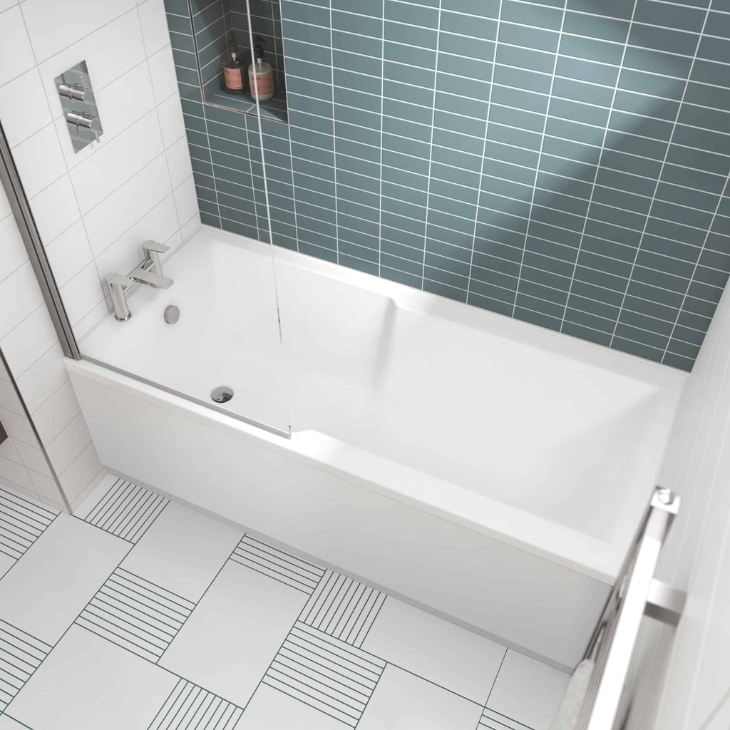 Bathtub with glass shower screen, modern bathroom design, blue tiled wall, white ceramic tiles, sleek chrome fixtures, contemporary bathroom renovation, Bubly Bathrooms UK.