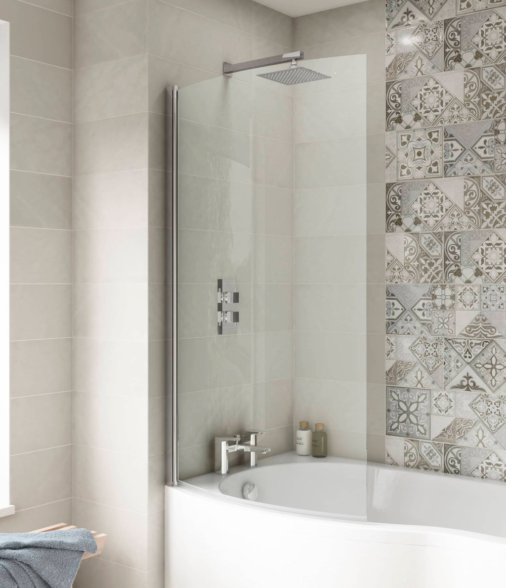 Modern walk-in shower with glass screen and stylish beige and patterned tiles in a contemporary bathroom setting.