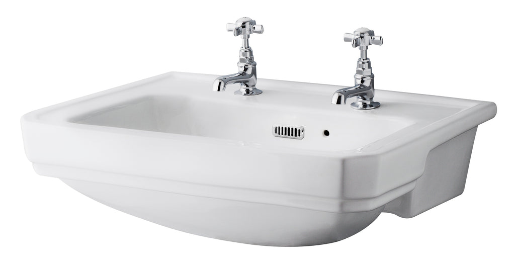 Polished ceramic washbasin with twin taps, ideal for traditional and contemporary bathrooms, featuring sturdy chrome fixtures and a built-in overflow.
