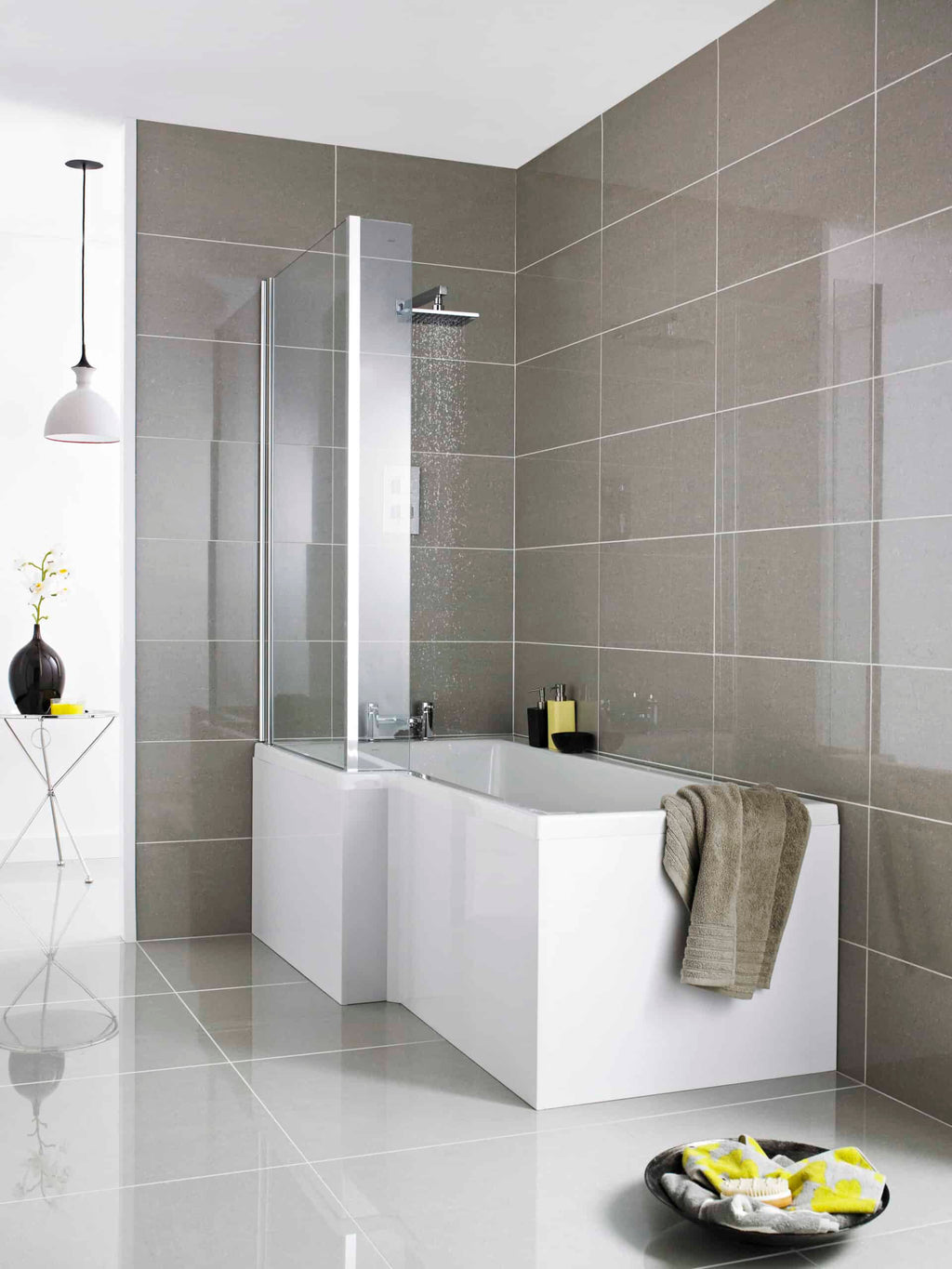 Sleek modern bathroom with walk-in shower and bathtub featuring clean lines, grey tiles, and contemporary fixtures, ideal for stylish bathroom renovation or bathroom design projects.