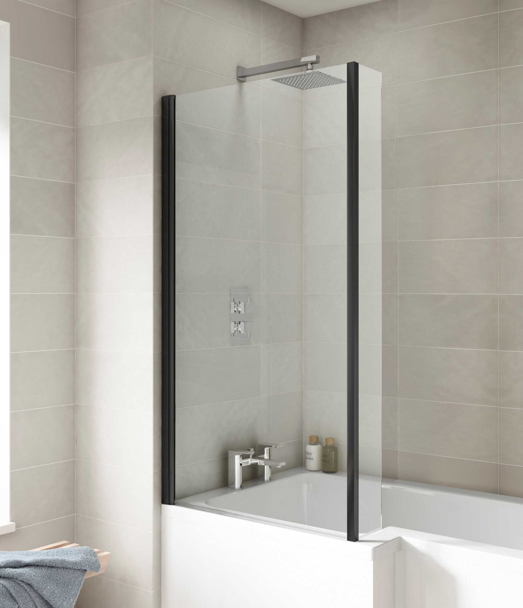 Modern bathroom shower screen with grey tiles and sleek fixtures, creating a contemporary bathroom design. Perfect for stylish bathroom renovations and enhancing space efficiency.