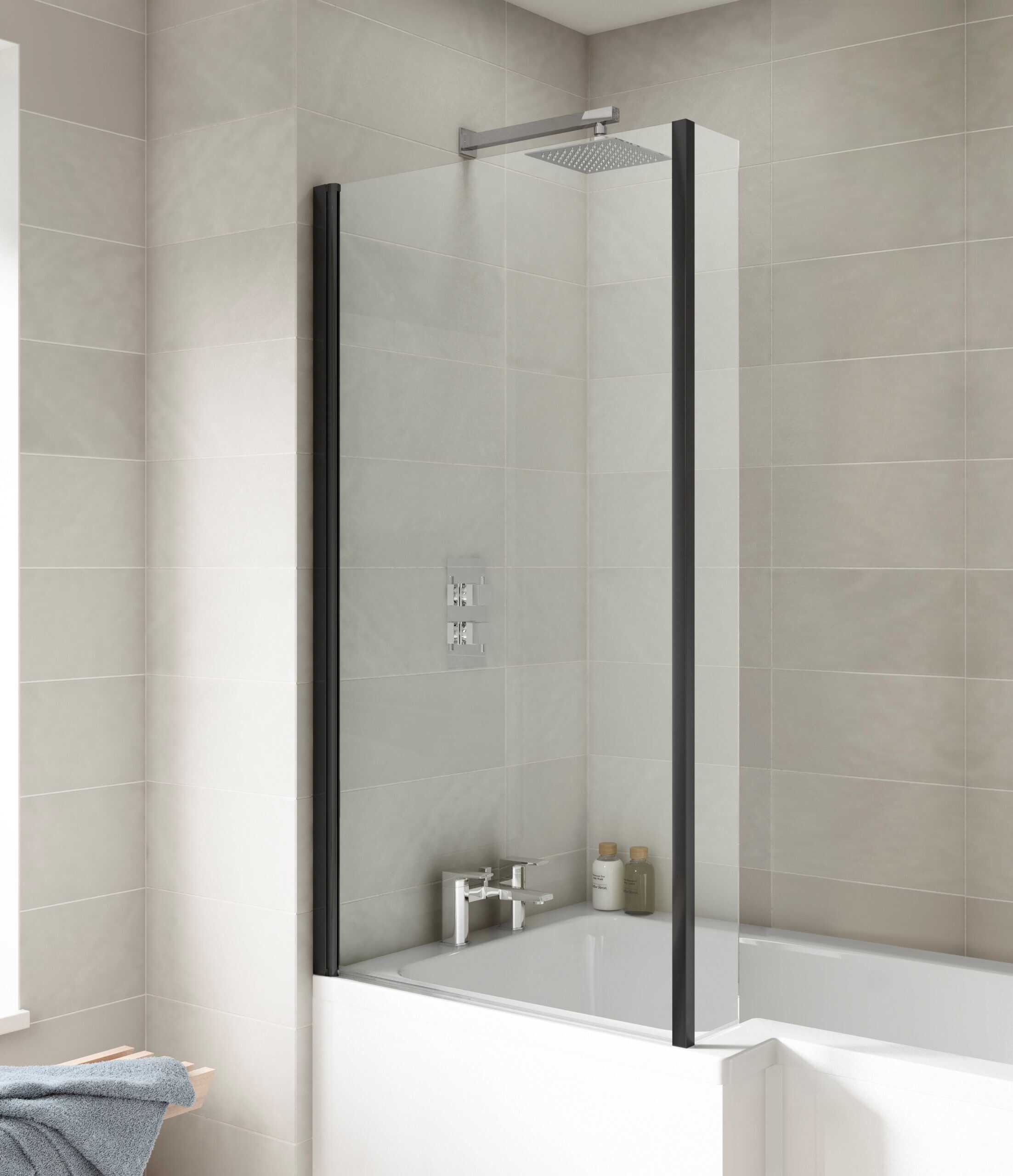 Modern bathroom shower screen with grey tiles and sleek fixtures, creating a contemporary bathroom design. Perfect for stylish bathroom renovations and enhancing space efficiency.