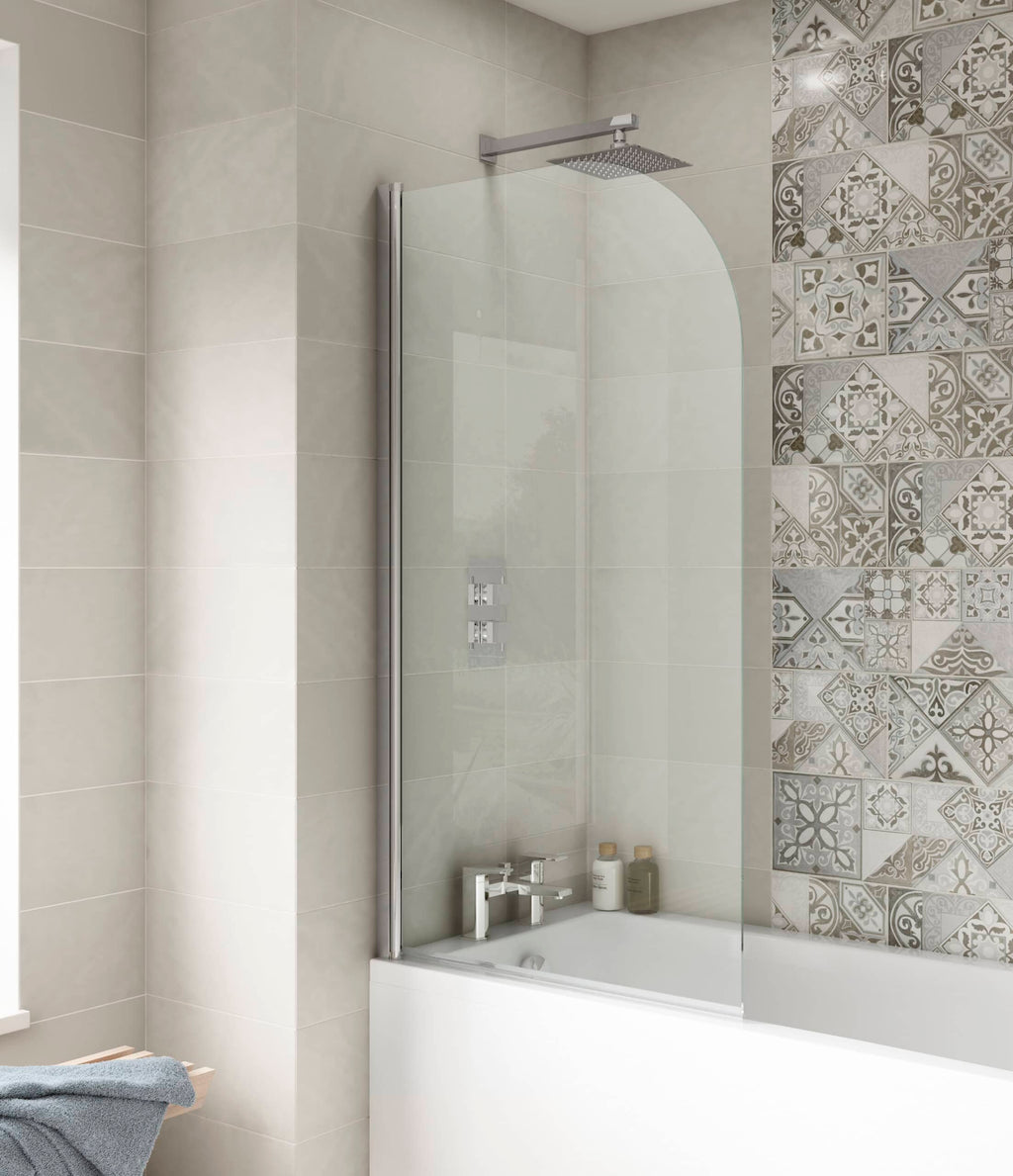 Modern walk-in shower with glass screen and decorative tiles, creating a stylish bathroom space. Ideal for contemporary bathrooms seeking luxury, functionality, and elegant design.