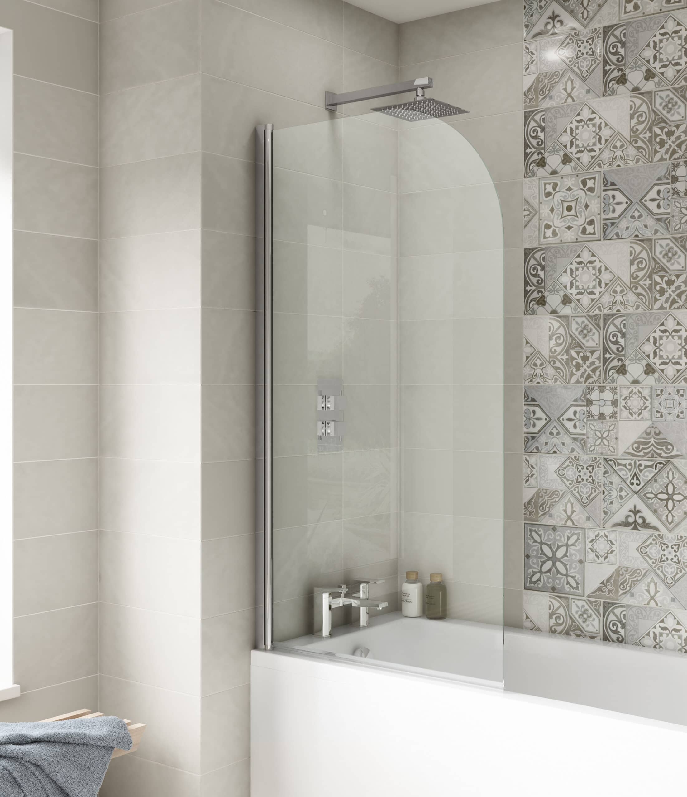 Modern walk-in shower with glass screen and decorative tiles, creating a stylish bathroom space. Ideal for contemporary bathrooms seeking luxury, functionality, and elegant design.