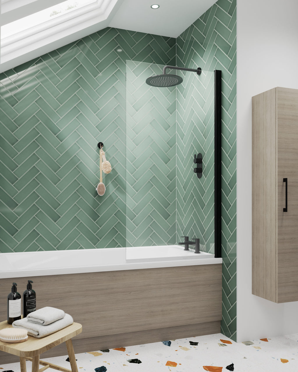 Luxury bathroom with green herringbone tiles, black shower fixtures and wooden accents for a modern, stylish bathroom design.