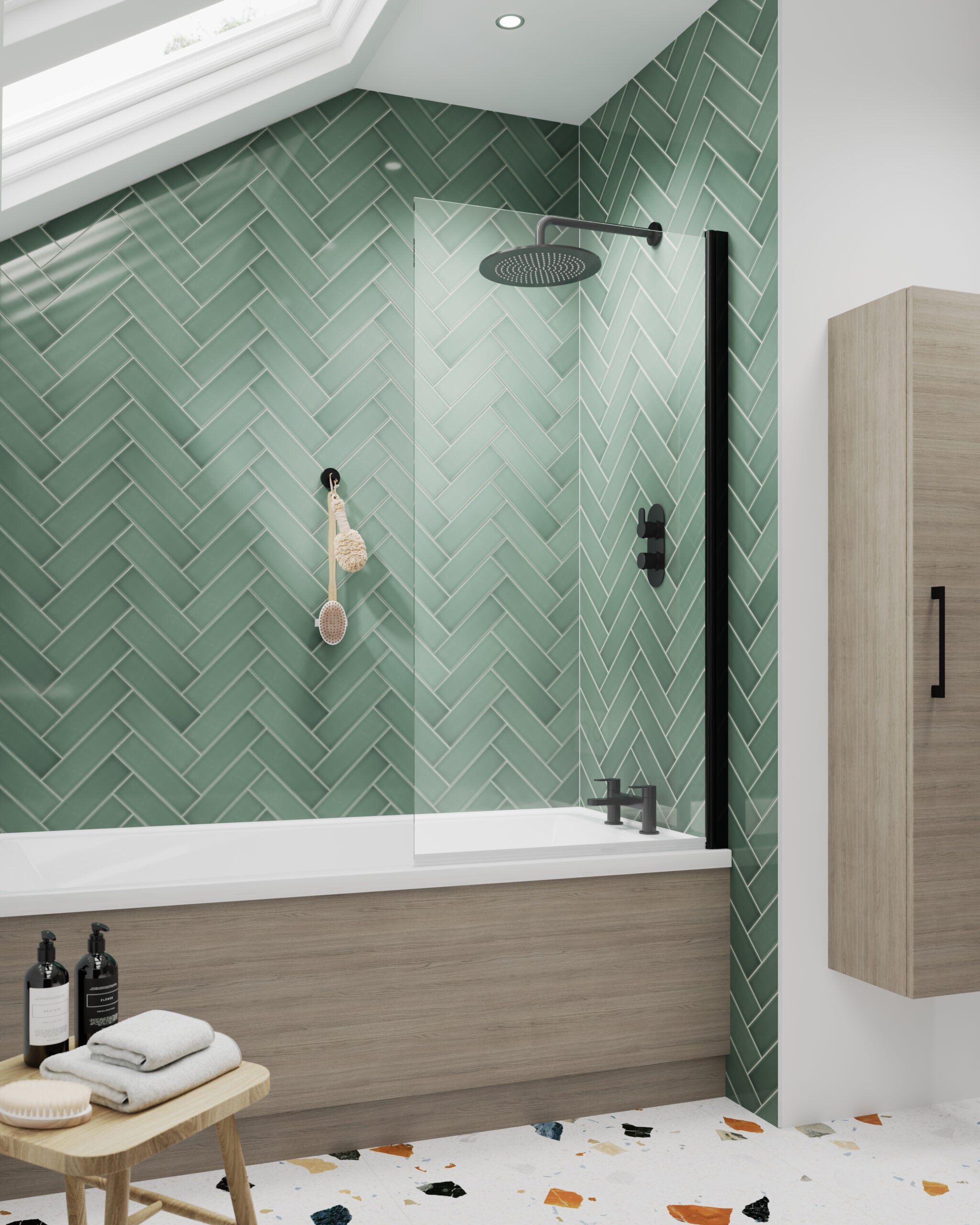 Luxury bathroom with green herringbone tiles, black shower fixtures and wooden accents for a modern, stylish bathroom design.
