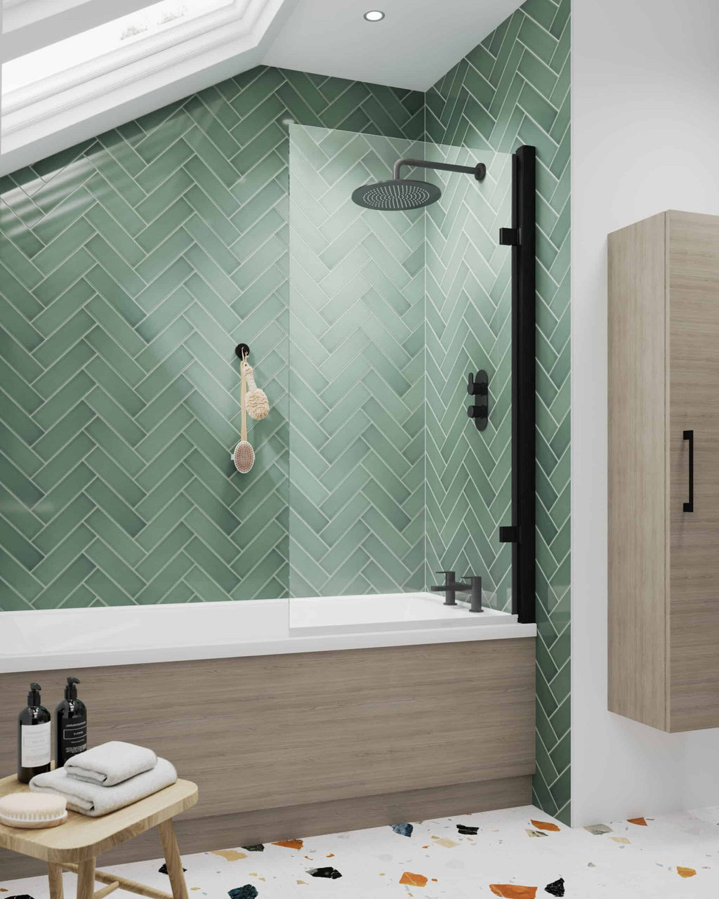 Modern bathroom shower area with black fixtures, green herringbone tile wall, under skylight, featuring a wooden bath panel, glass screen, and minimalist accessories for a stylish bathroom design.