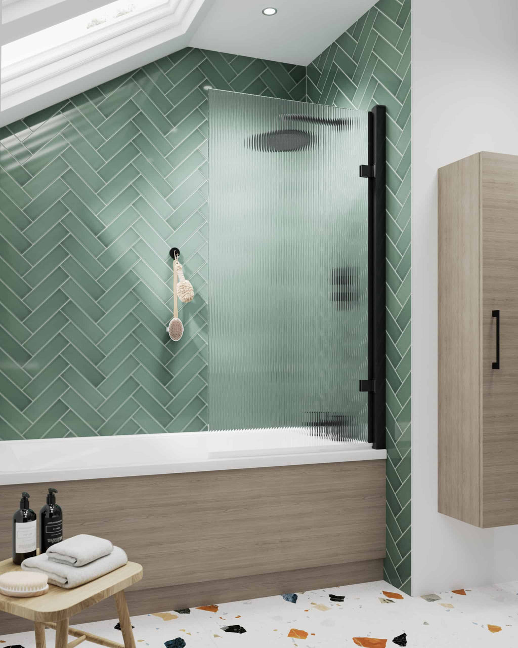 Shower with green herringbone tiles and textured glass door in a modern bathroom.