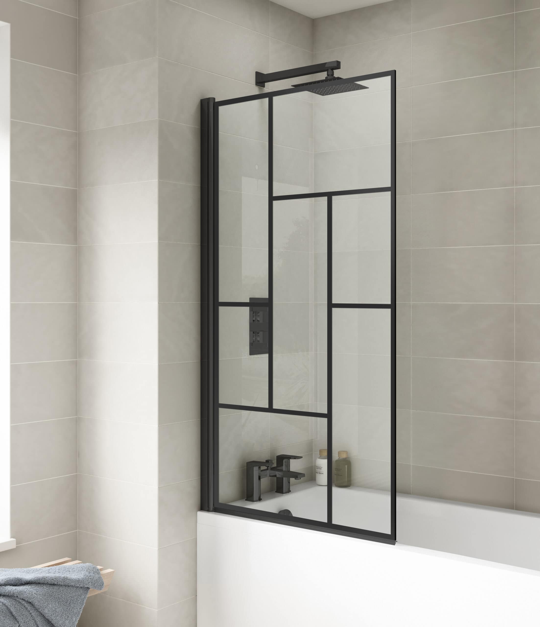 Modern black framed glass shower screen for contemporary bathroom design.