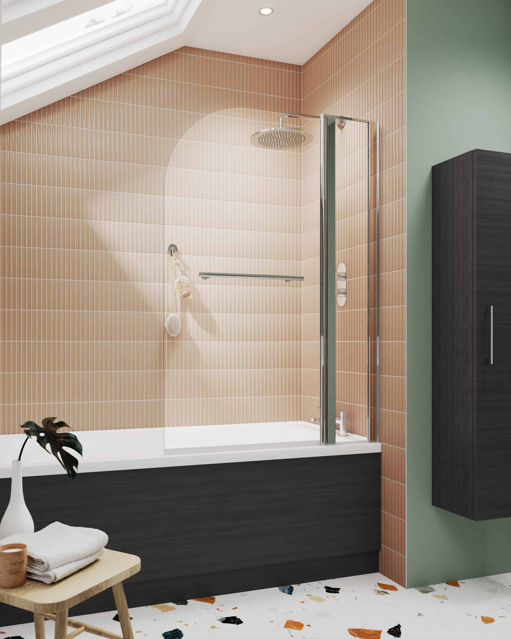 Modern walk-in shower with glass screen, pink brick-effect tiles, black bathtub panel, and stylish elements in a contemporary bathroom setting.