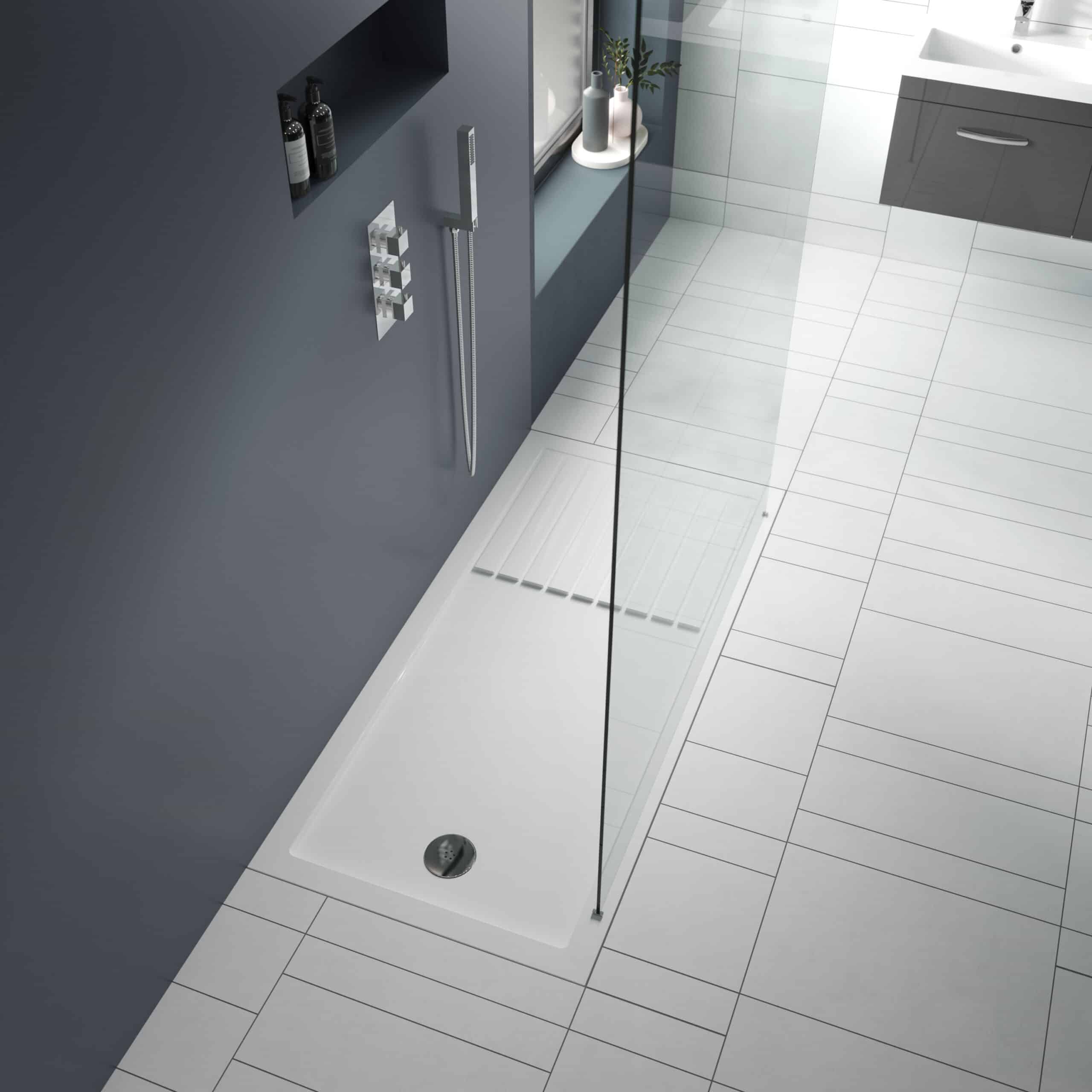 Modern walk-in shower with a glass screen, stylish grey wall, and white tiled floor, featuring sleek fixtures and a minimalist design for contemporary bathrooms.