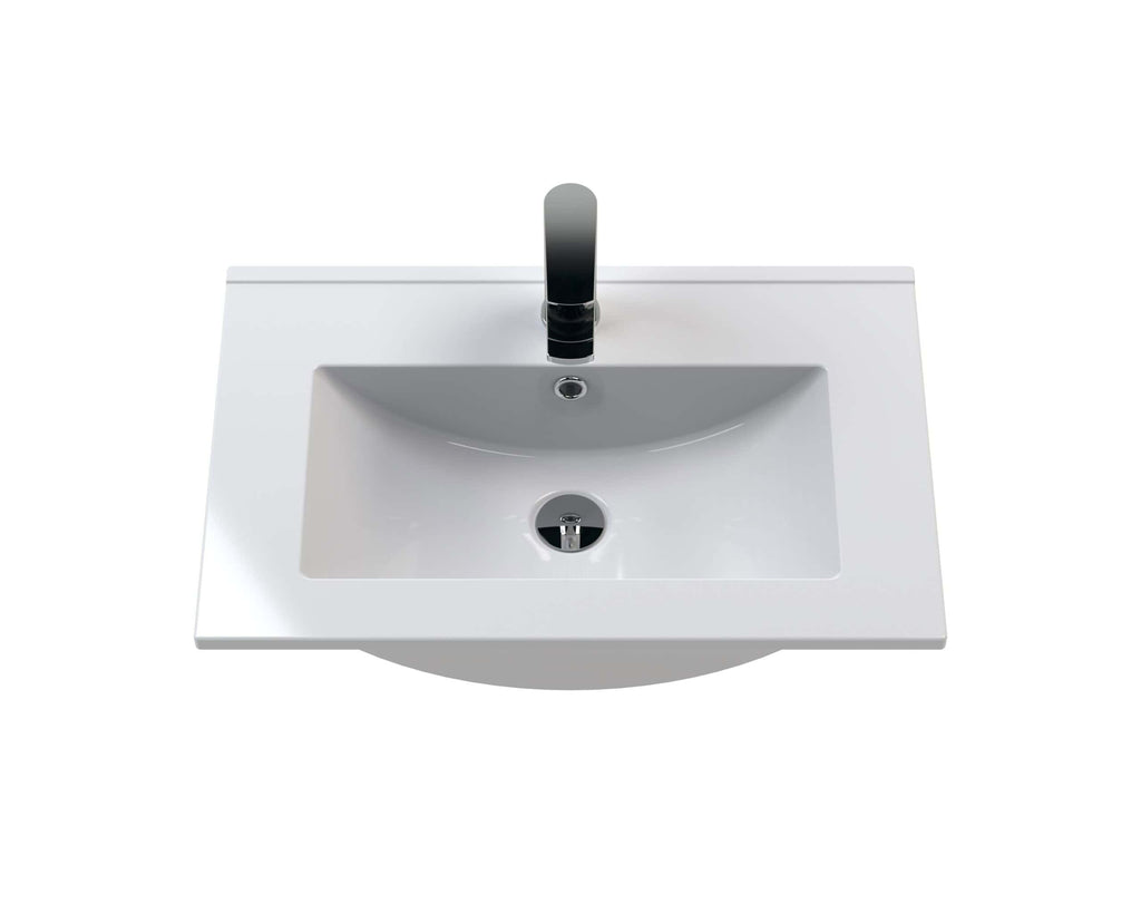 Sleek white bathroom vanity sink with modern chrome tap, designed for stylish and functional bathroom interiors. Ideal for contemporary bathroom renovations and upgrades.