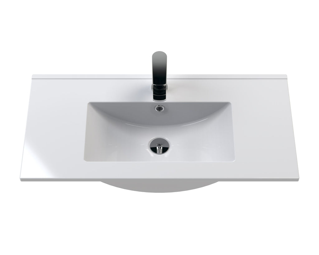 Sleek white bathroom sink with modern black tap, designed for stylish and functional bathroom renovation by Bubly Bathrooms.