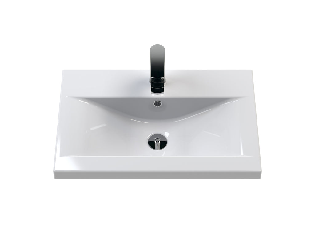 Sleek white rectangular bathroom sink with modern black tap, suitable for contemporary bathroom designs, featuring easy-to-clean surfaces for hygienic use.