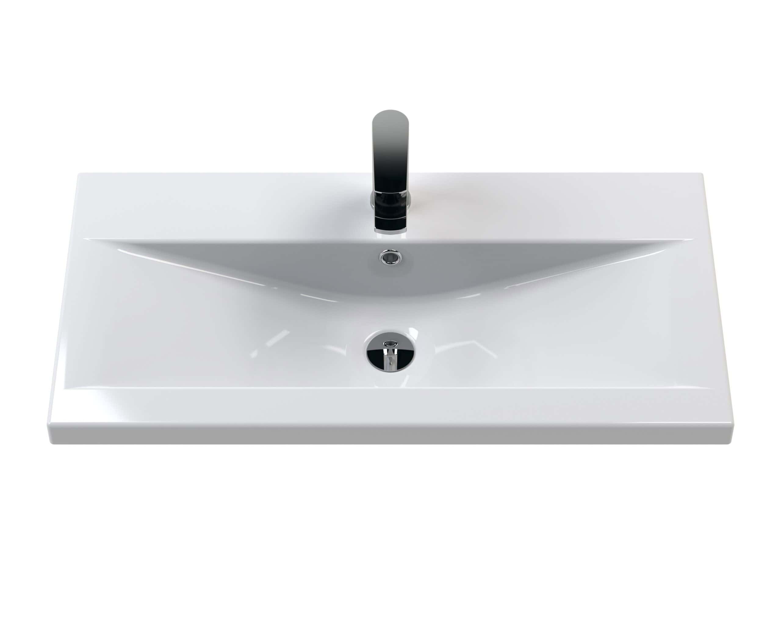 Sleek modern white bathroom sink with black single lever tap, durable ceramic surface and integrated overflow, perfect for contemporary bathroom designs.