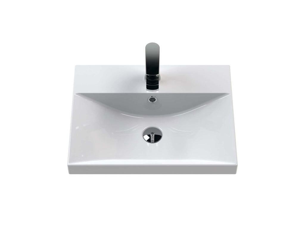 Contemporary white bathroom sink with sleek black tap, ideal for modern bathrooms. Perfect for bathroom renovation, featuring high-quality ceramic material and easy installation.