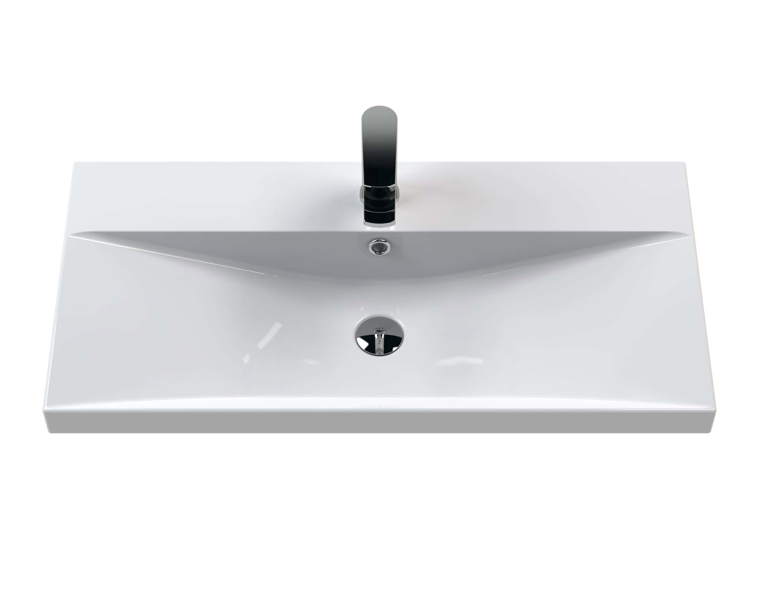 Sleek modern white bathroom sink with integrated basin and black single-handle tap for stylish bathroom design. Perfect for contemporary bathrooms seeking clean aesthetics and functional fixtures.