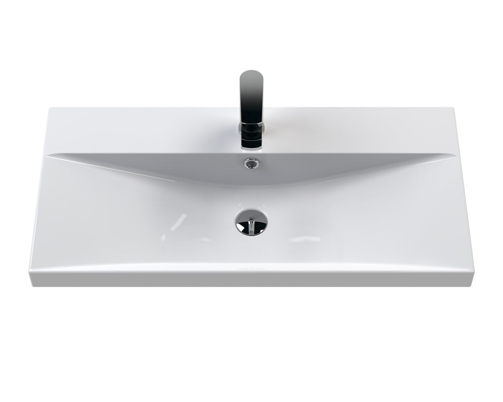 Shiny white rectangular bathroom sink with sleek black faucet, modern design, ideal for contemporary bathrooms, high-quality ceramic material.