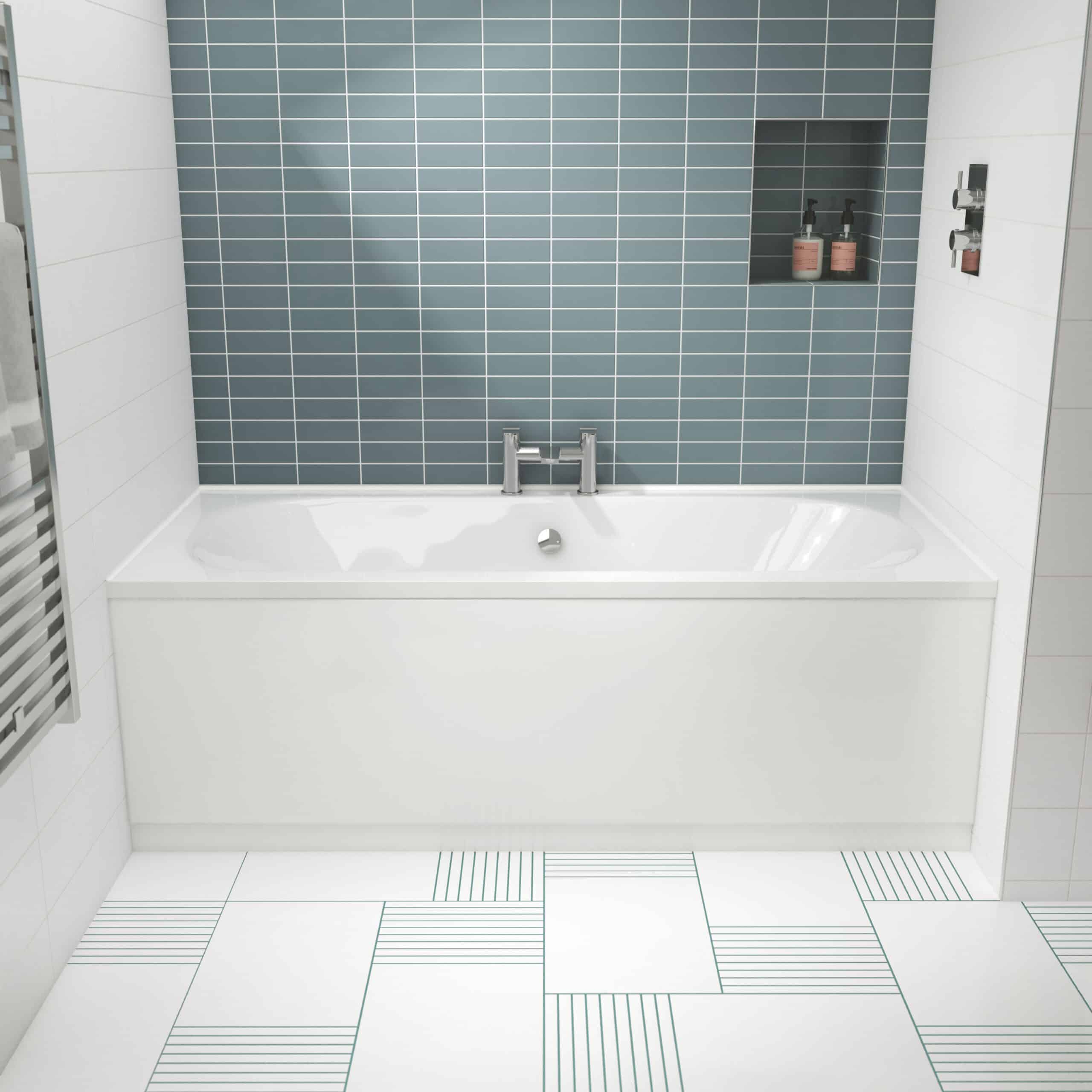 Sleek modern bathtub with blue subway tile wall and built-in shower niche in contemporary bathroom design.