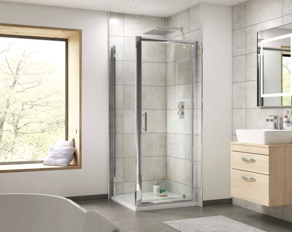 Minimalist bathroom with glass shower enclosure, modern vanity, large window with sitting nook, and neutral colour scheme, ideal for contemporary bathroom design.
